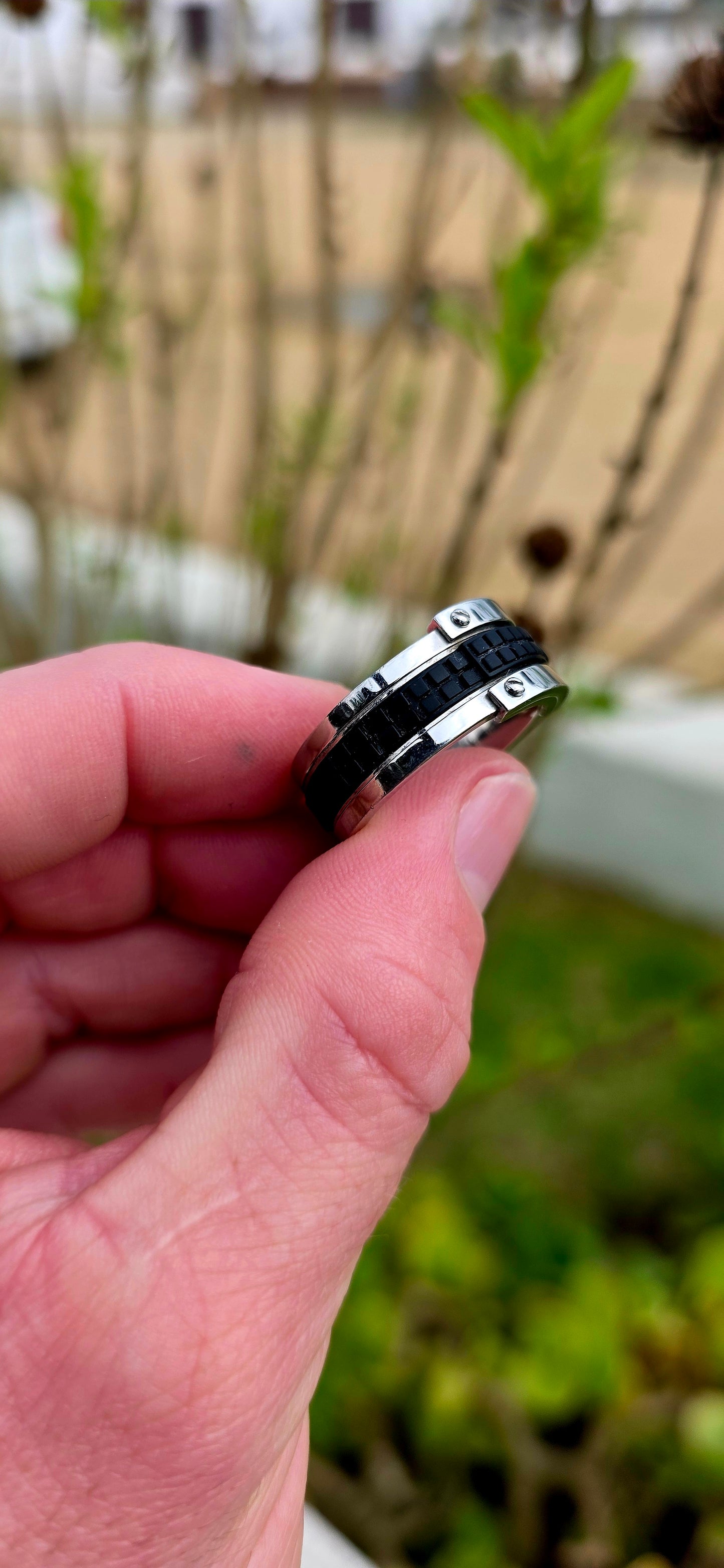 Bold, masculine, and contemporary... this chunky designer ring by Emporio Armani perfectly captures the sleek industrial aesthetic that has become synonymous with the brand's modern menswear collections.