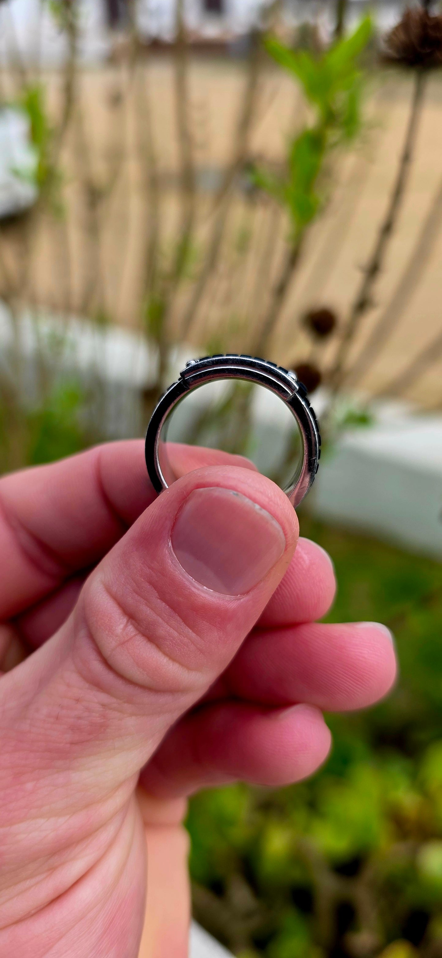 Bold, masculine, and contemporary... this chunky designer ring by Emporio Armani perfectly captures the sleek industrial aesthetic that has become synonymous with the brand's modern menswear collections.