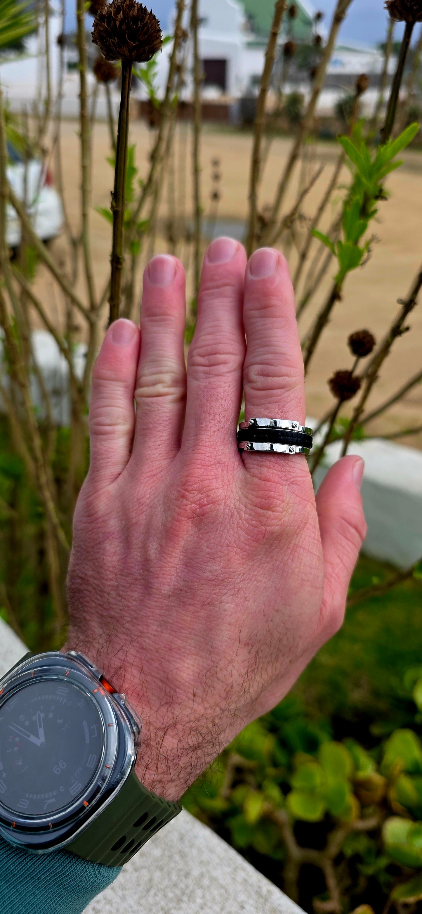 Bold, masculine, and contemporary... this chunky designer ring by Emporio Armani perfectly captures the sleek industrial aesthetic that has become synonymous with the brand's modern menswear collections.
