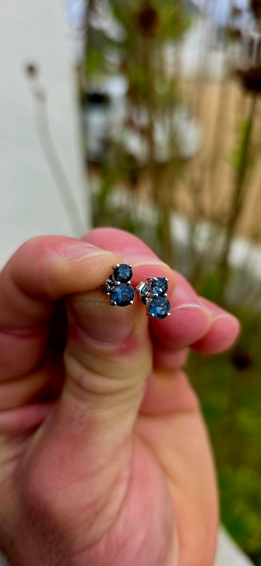 Simple, classical and stylish... these sterling silver double-stud earrings prove that sometimes the most elegant designs are also the most wearable.