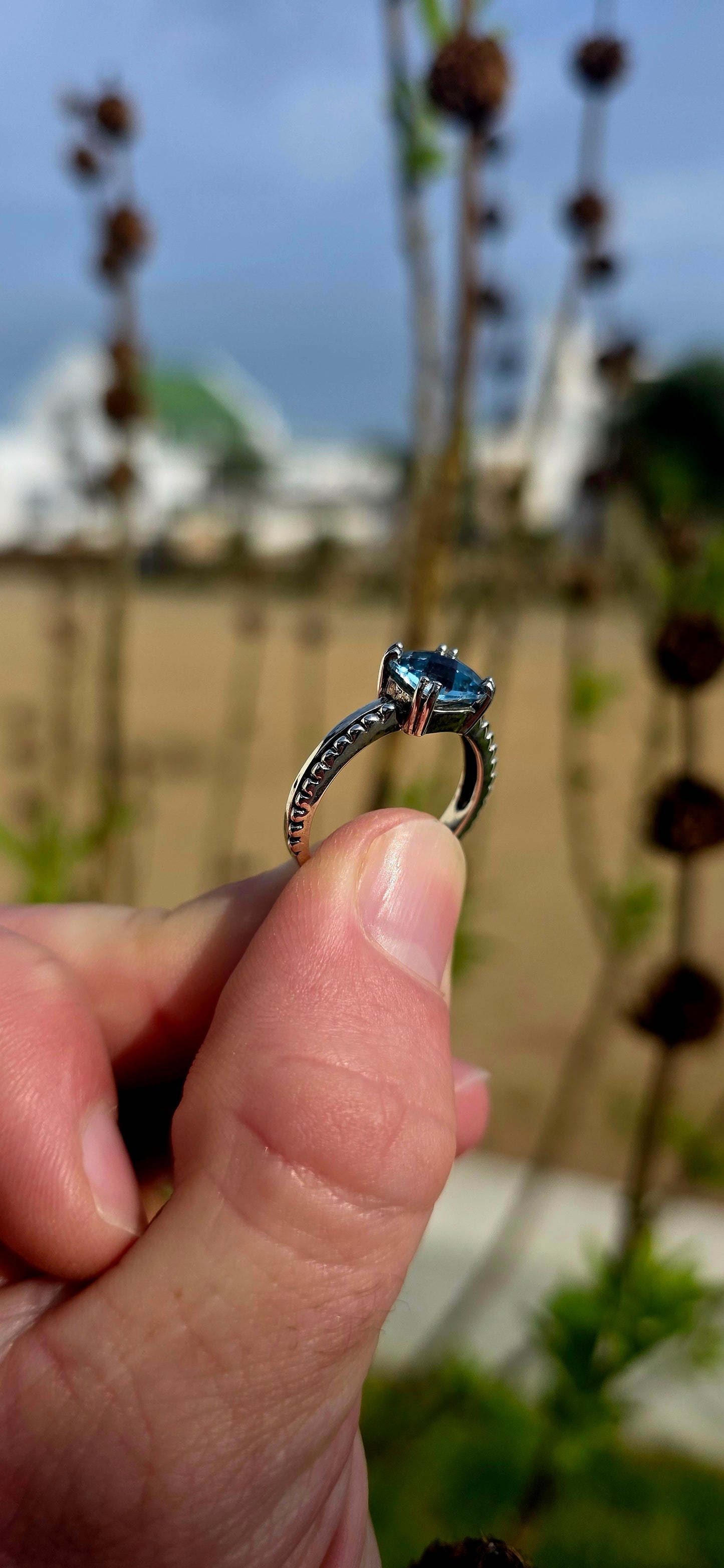 Delicate, elegant and wonderfully unique... this sterling silver solitaire ring offers a fresh take on a timeless classic .