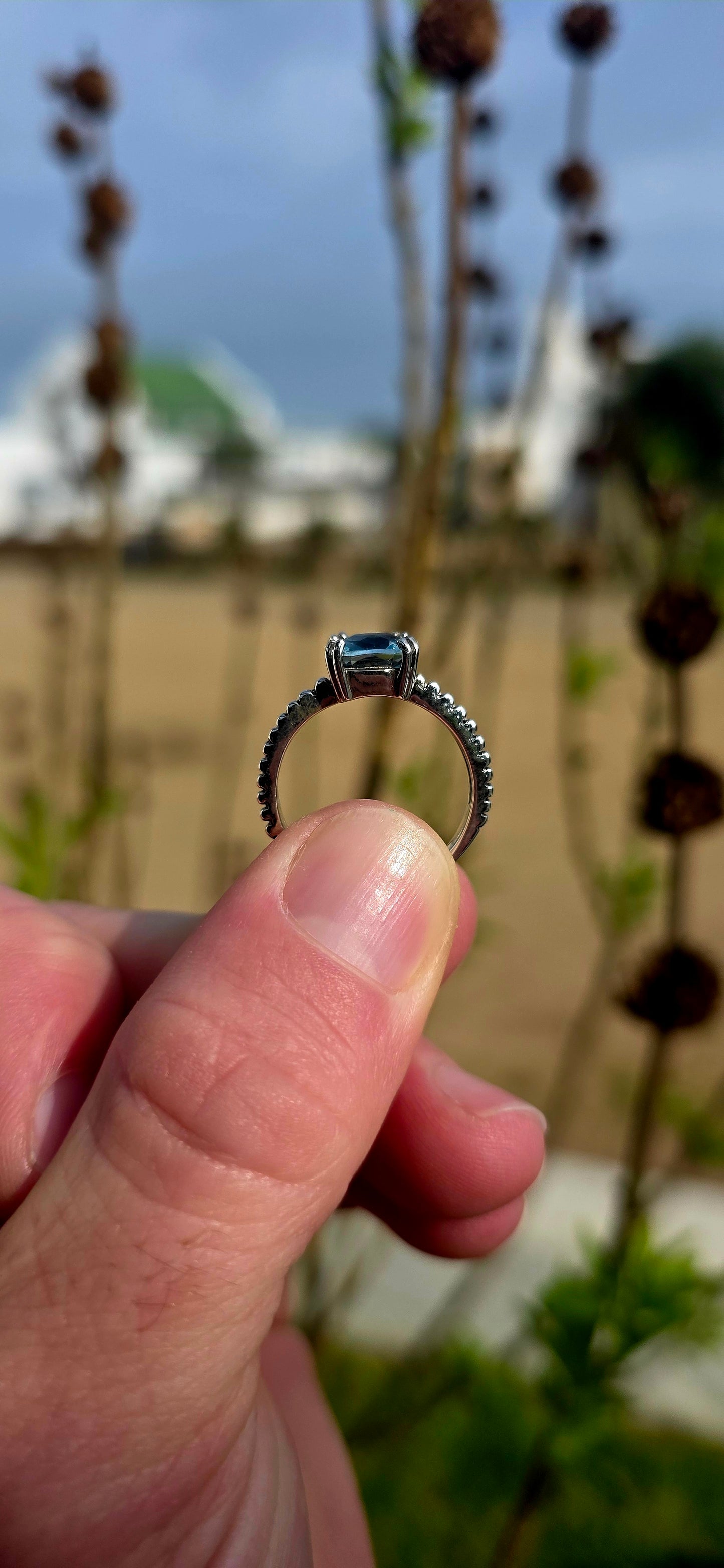 Delicate, elegant and wonderfully unique... this sterling silver solitaire ring offers a fresh take on a timeless classic .