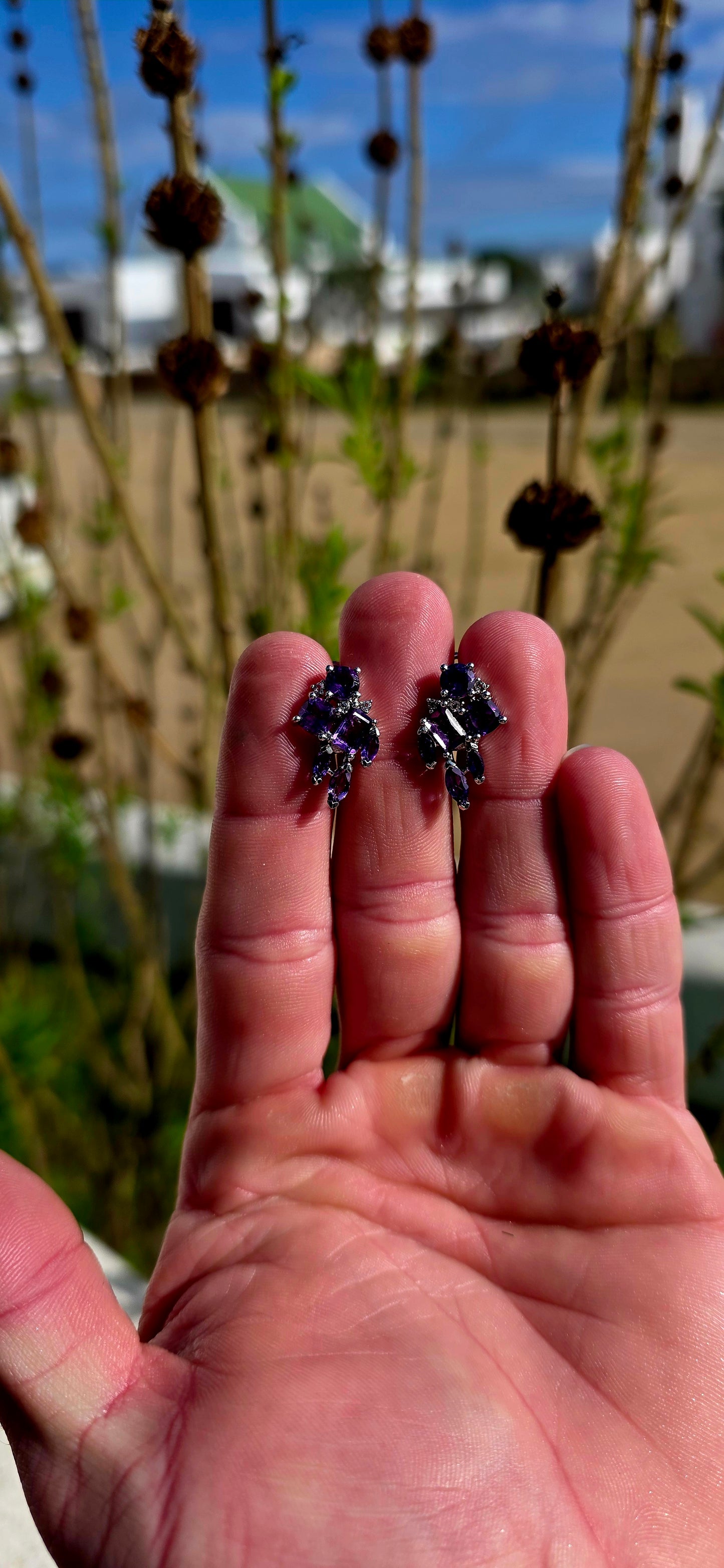 Bold, glamorous and bursting with royal colour...
Crafted in sterling silver, each earring is adorned with a dazzling arrangement of richly coloured amethyst gemstones in a beautiful variety of cuts.