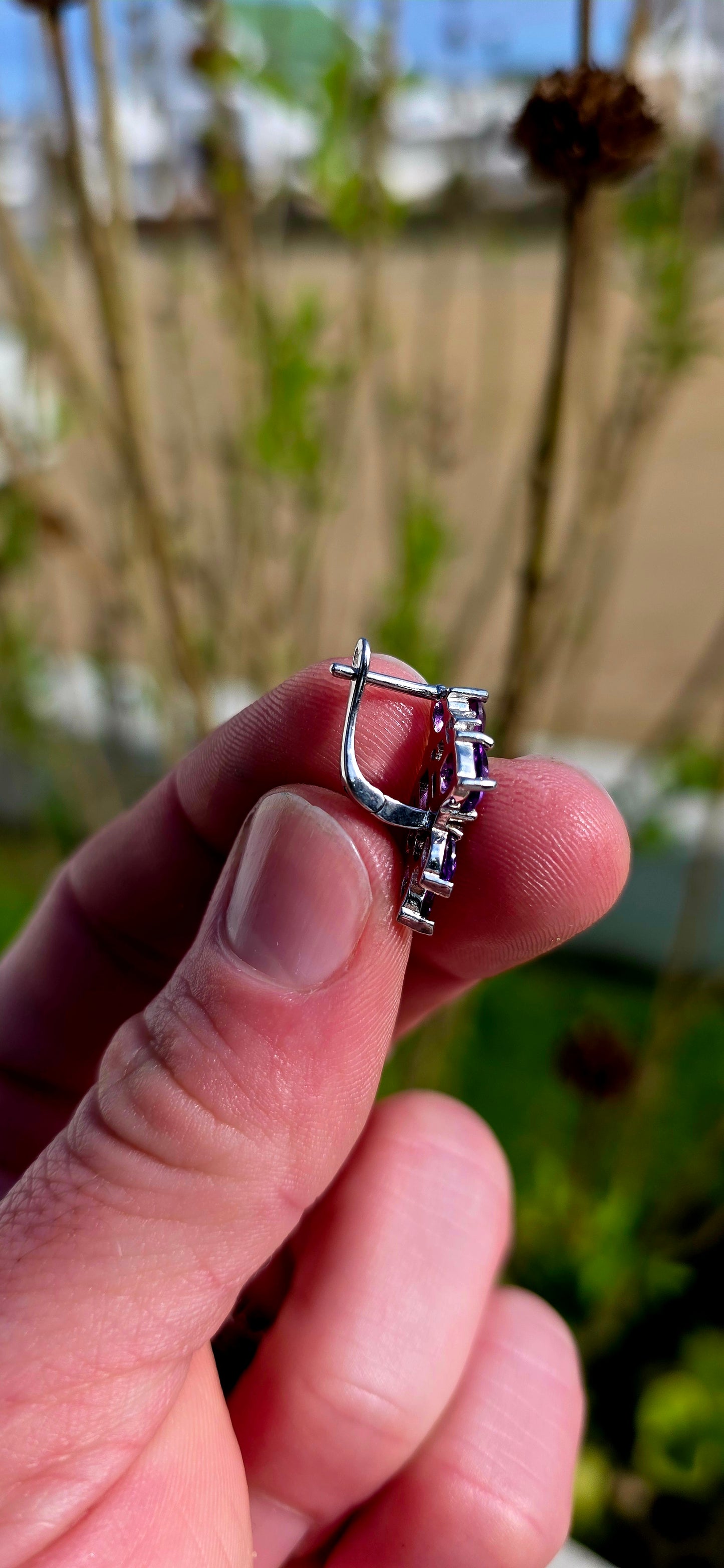 Bold, glamorous and bursting with royal colour...
Crafted in sterling silver, each earring is adorned with a dazzling arrangement of richly coloured amethyst gemstones in a beautiful variety of cuts.