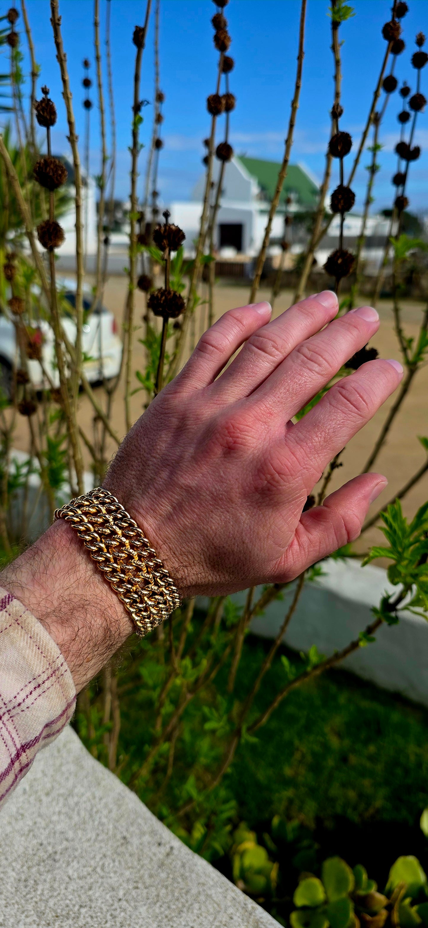 This absolutely magnificent vintage French bracelet is crafted in richly glowing yellow/rosy gold-filled metal and features an incredibly substantial three-row curb link design that drapes beautifully around the wrist.