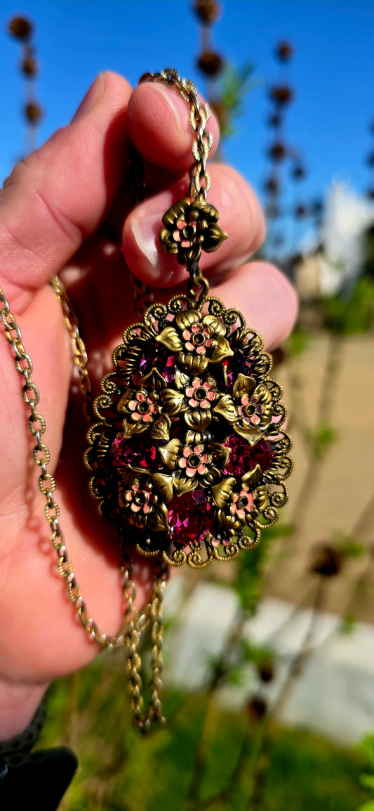 Dating to the glamorous Art Deco era, circa 1930s, this generously sized Czech pendant is a breathtaking celebration of colour, craftsmanship, and old-world romance.