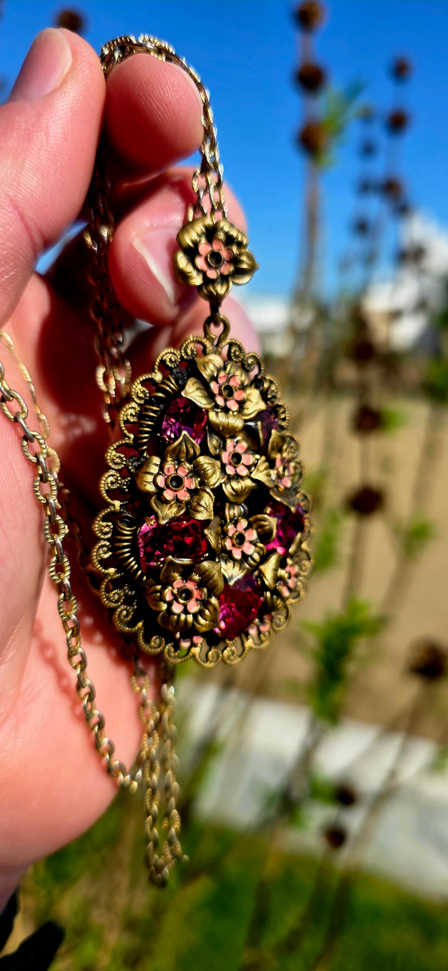 Dating to the glamorous Art Deco era, circa 1930s, this generously sized Czech pendant is a breathtaking celebration of colour, craftsmanship, and old-world romance.