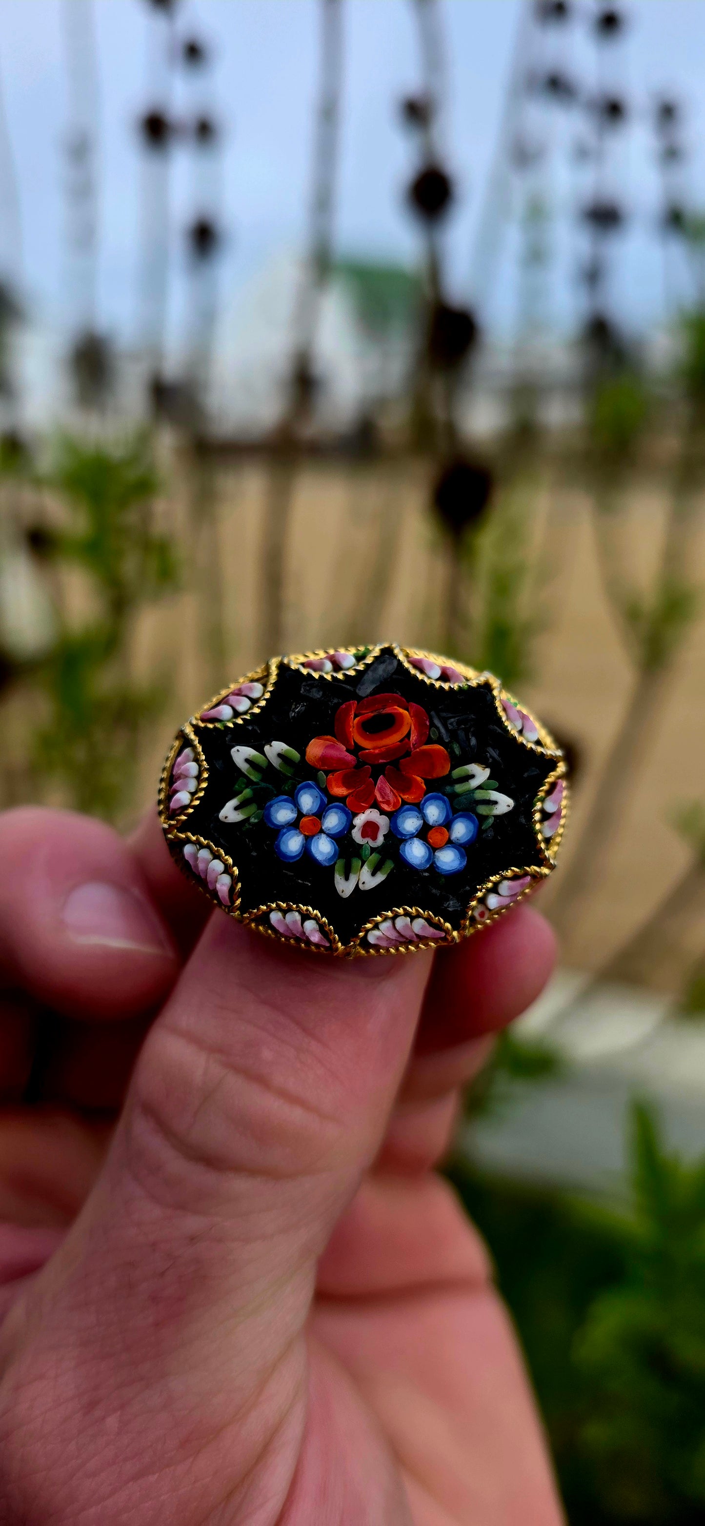 A wonderfully charming vintage jewellery suite dating to the 1970s, featuring a beautifully detailed micro mosaic brooch accompanied by its original matching clip-on earrings.