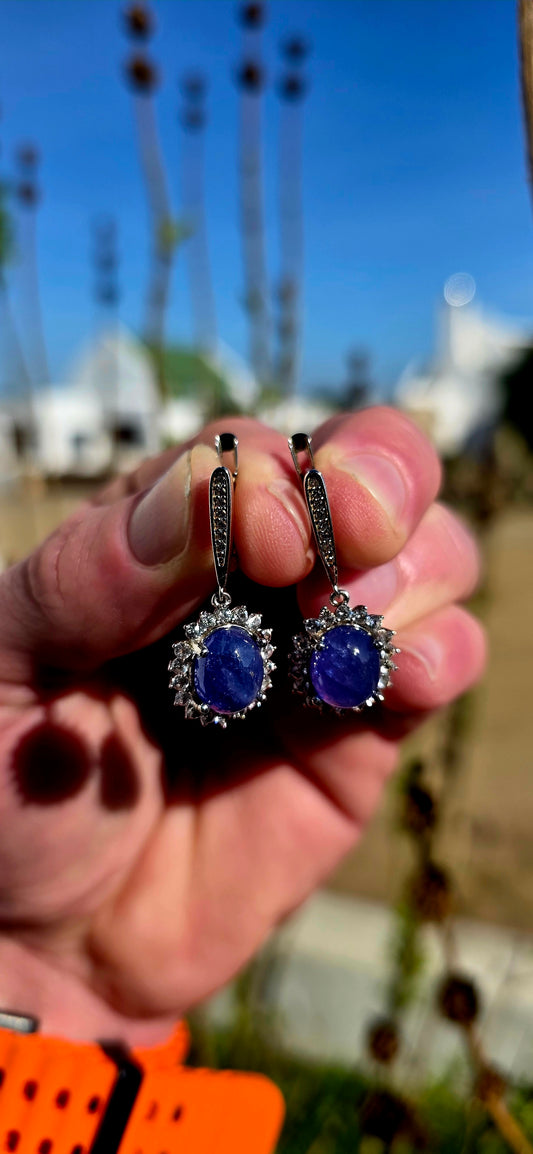 Pure sophistication with just the right touch of drama... these breathtaking sterling silver drop earrings are the kind of jewels that instantly elevate everything they are paired with.