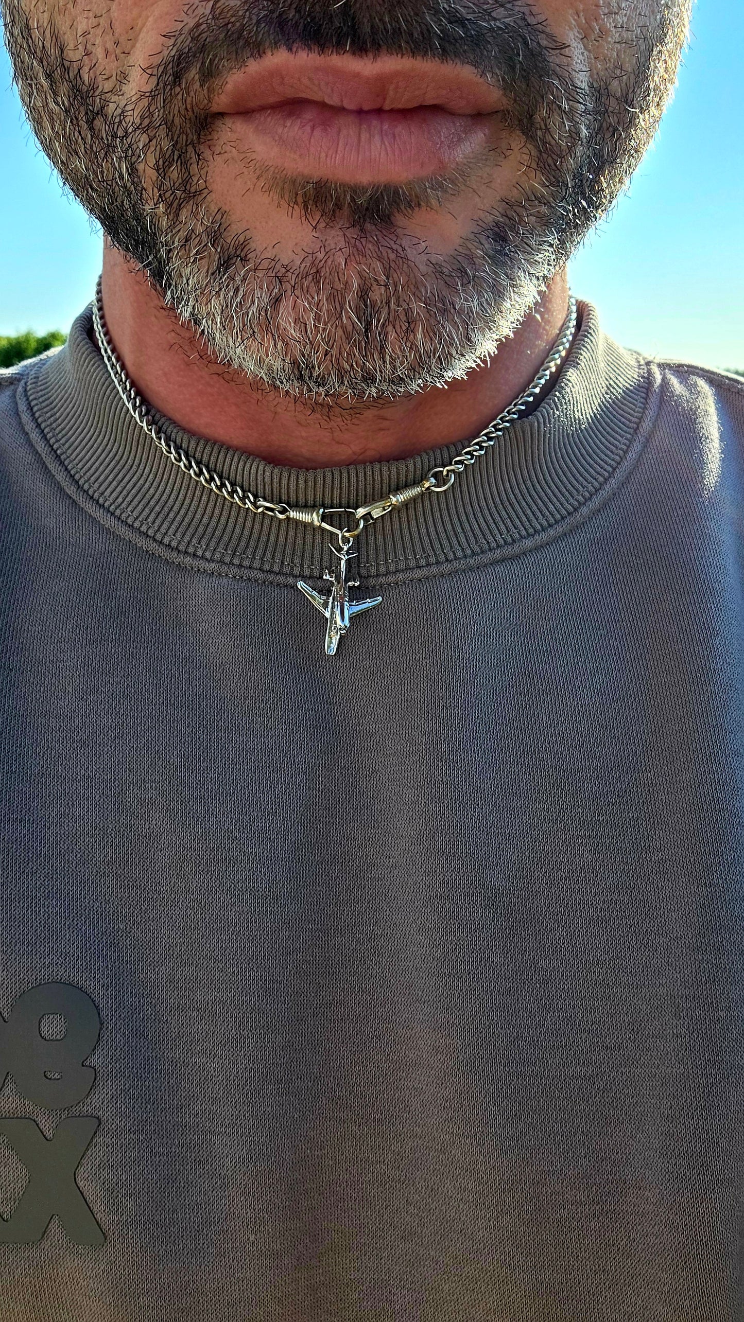 Up for grabs is a wonderfully detailed vintage sterling silver articulated charm in the shape of a miniature aeroplane.