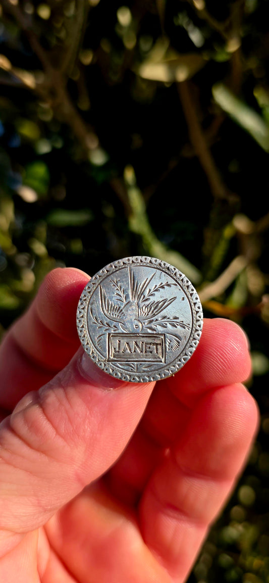A wonderfully sentimental survivor from the Victorian era, this antique sweetheart brooch was lovingly handcrafted from an authentic American silver coin dated 1858.