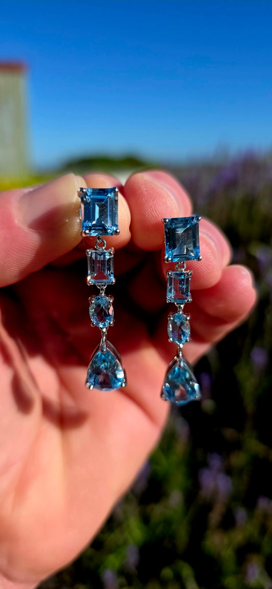 Cool, crisp, and effortlessly sophisticated... like tiny drops of a perfect summer sky.Sky Blue Topaz Drop Earrings.