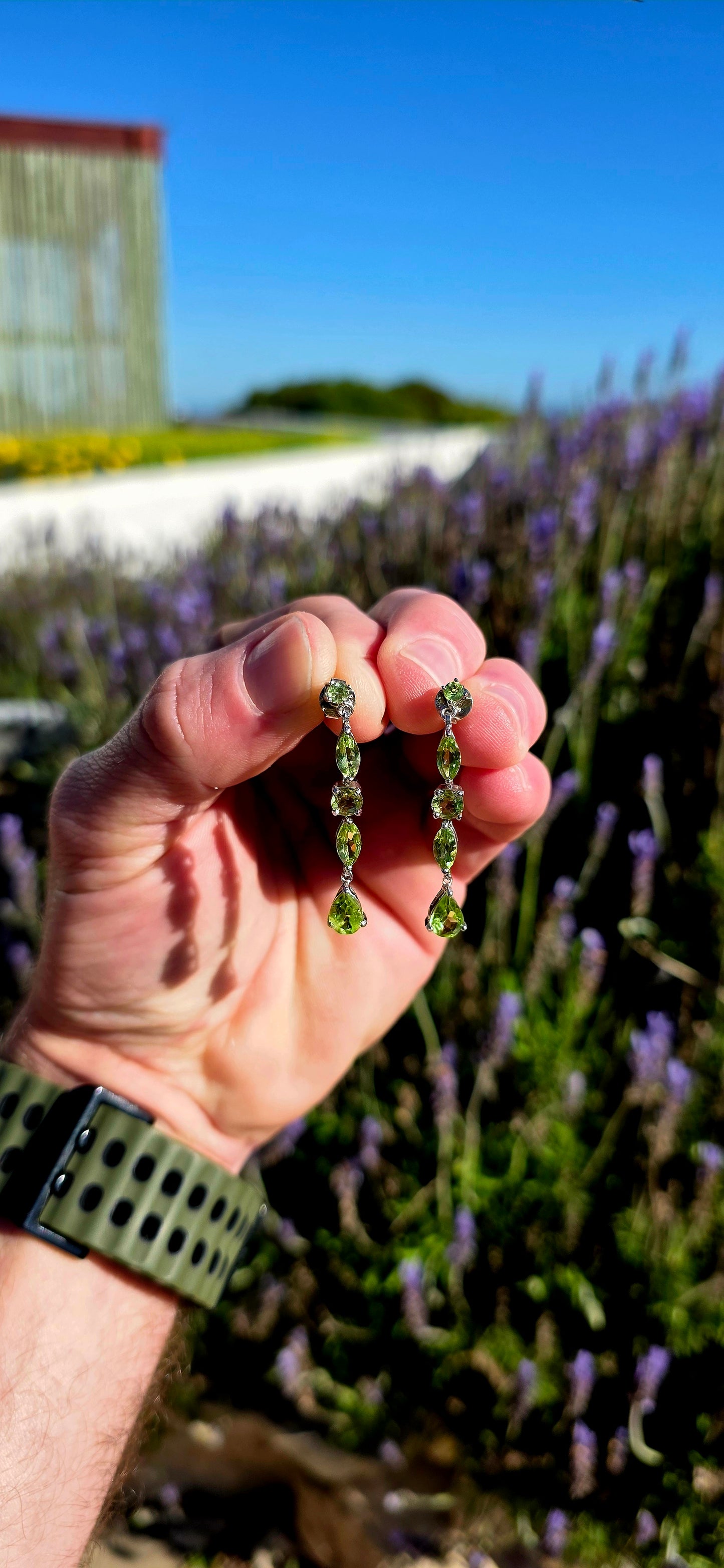 Fresh, vibrant, and full of sparkle... these beautiful sterling silver drop earrings capture the joyful colours of springtime in gemstone form.