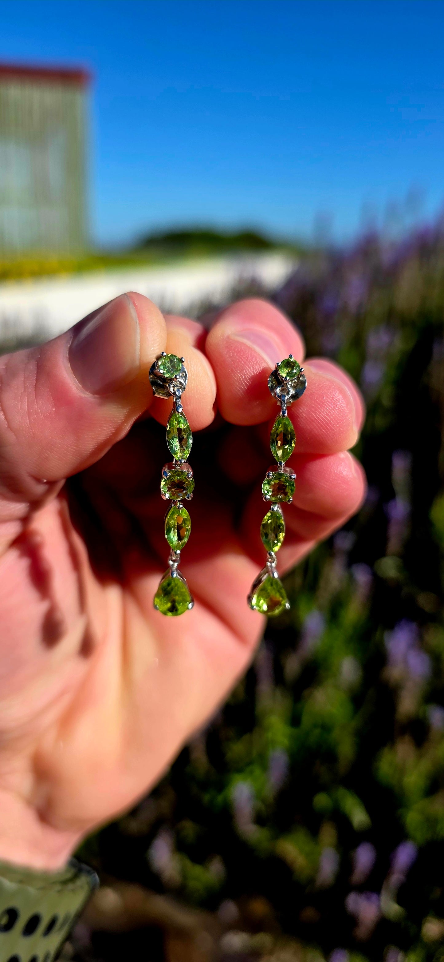 Fresh, vibrant, and full of sparkle... these beautiful sterling silver drop earrings capture the joyful colours of springtime in gemstone form.