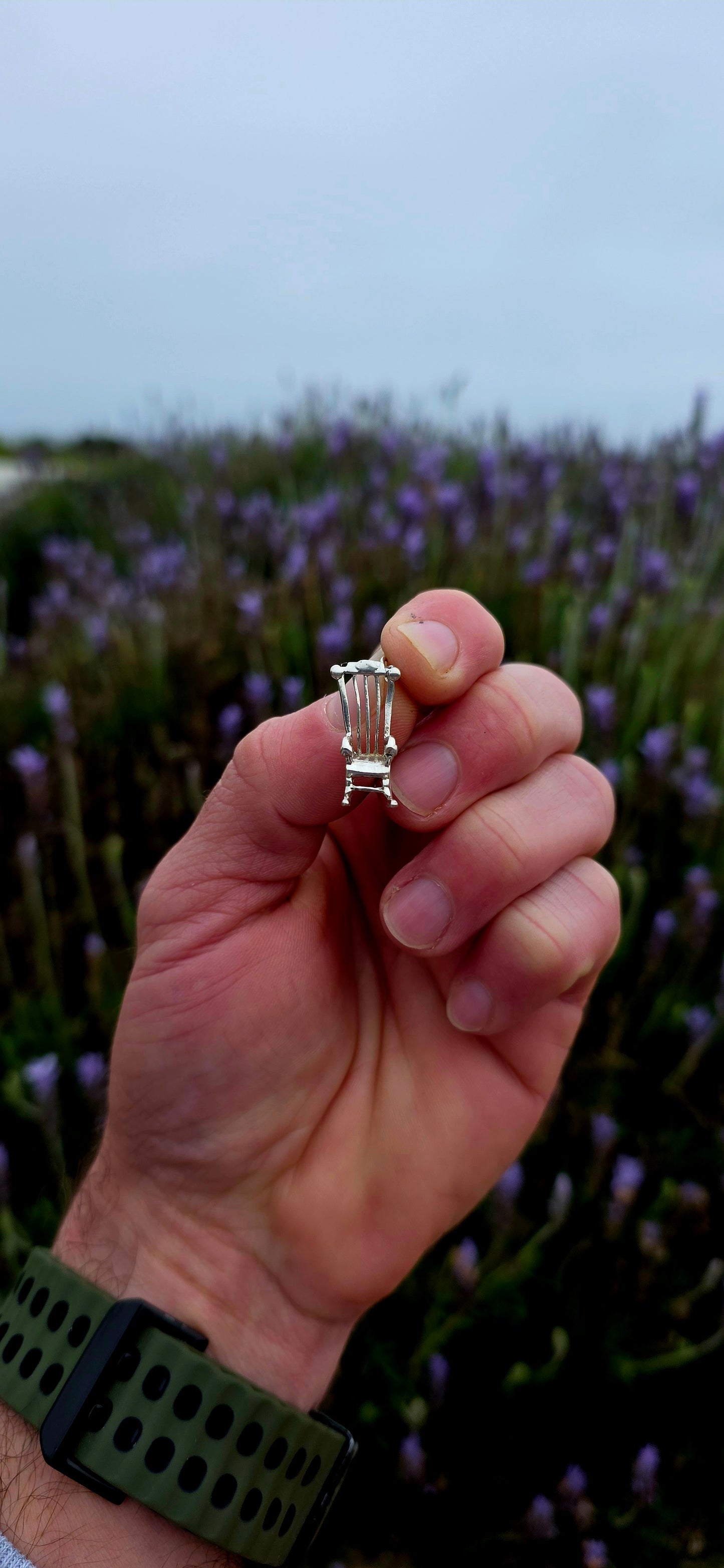 A wonderfully detailed and generously sized vintage sterling silver charm crafted in the shape of a traditional rocking chair.
