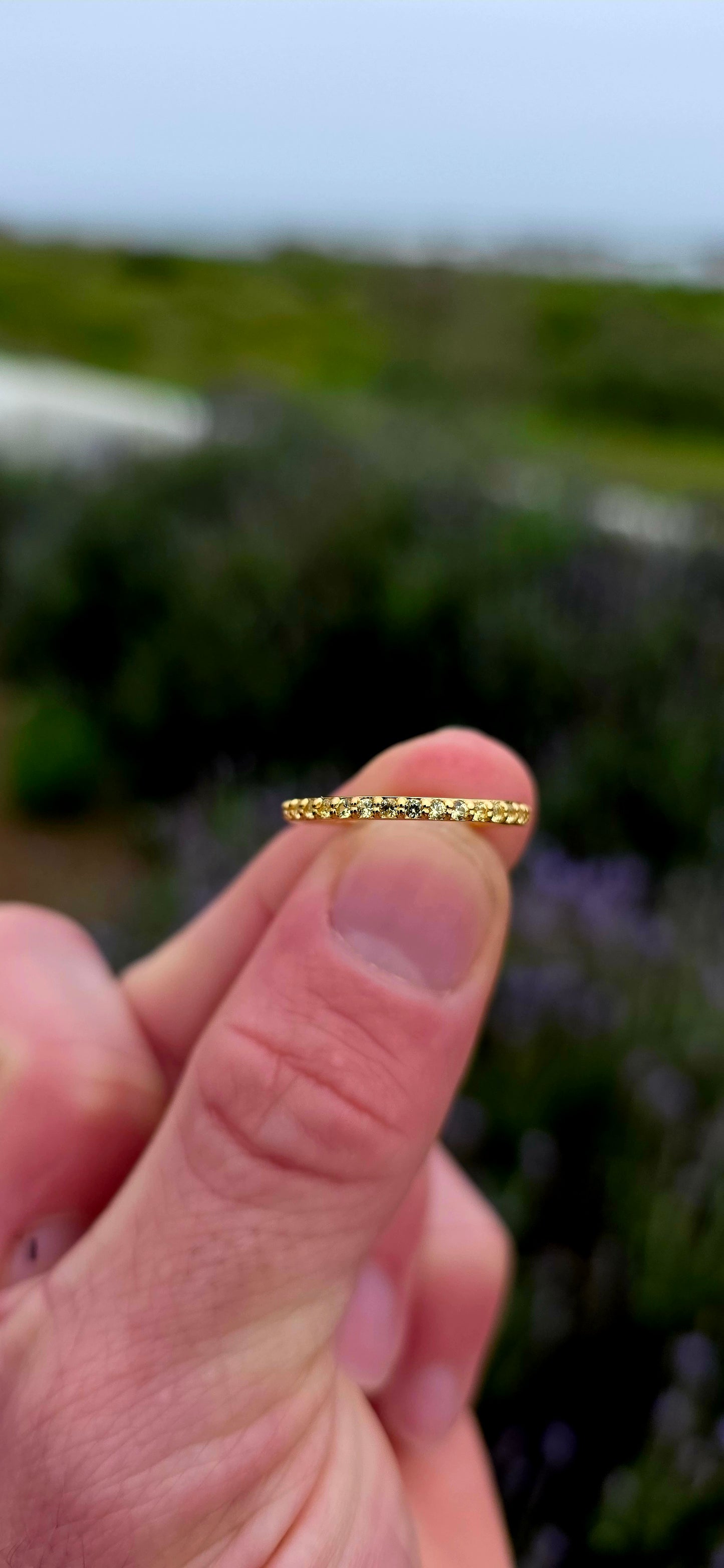 A fine and dainty full eternity stacking band, crafted in solid sterling silver and finished with a rich layer of 18ct yellow gold plating for that warm, sun-kissed glow.