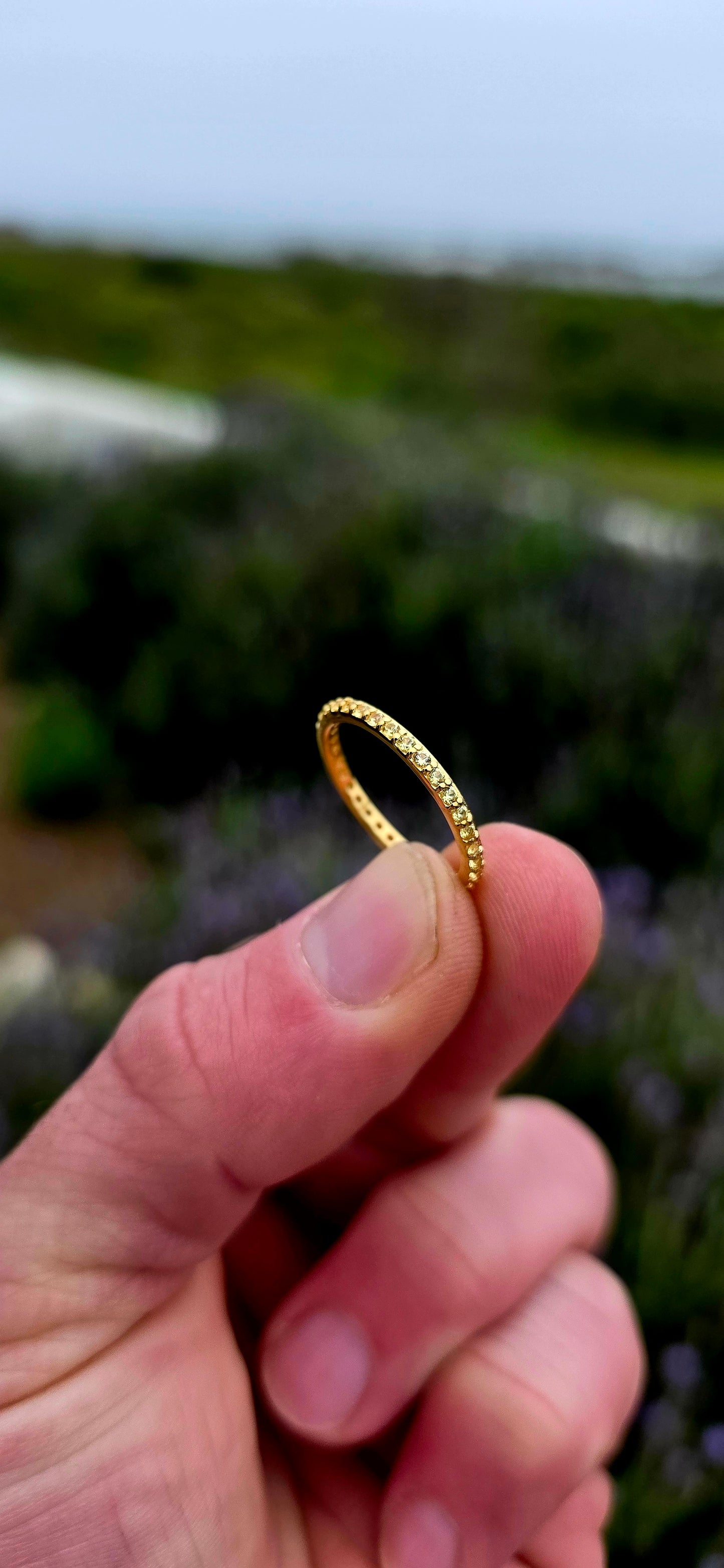 A fine and dainty full eternity stacking band, crafted in solid sterling silver and finished with a rich layer of 18ct yellow gold plating for that warm, sun-kissed glow.