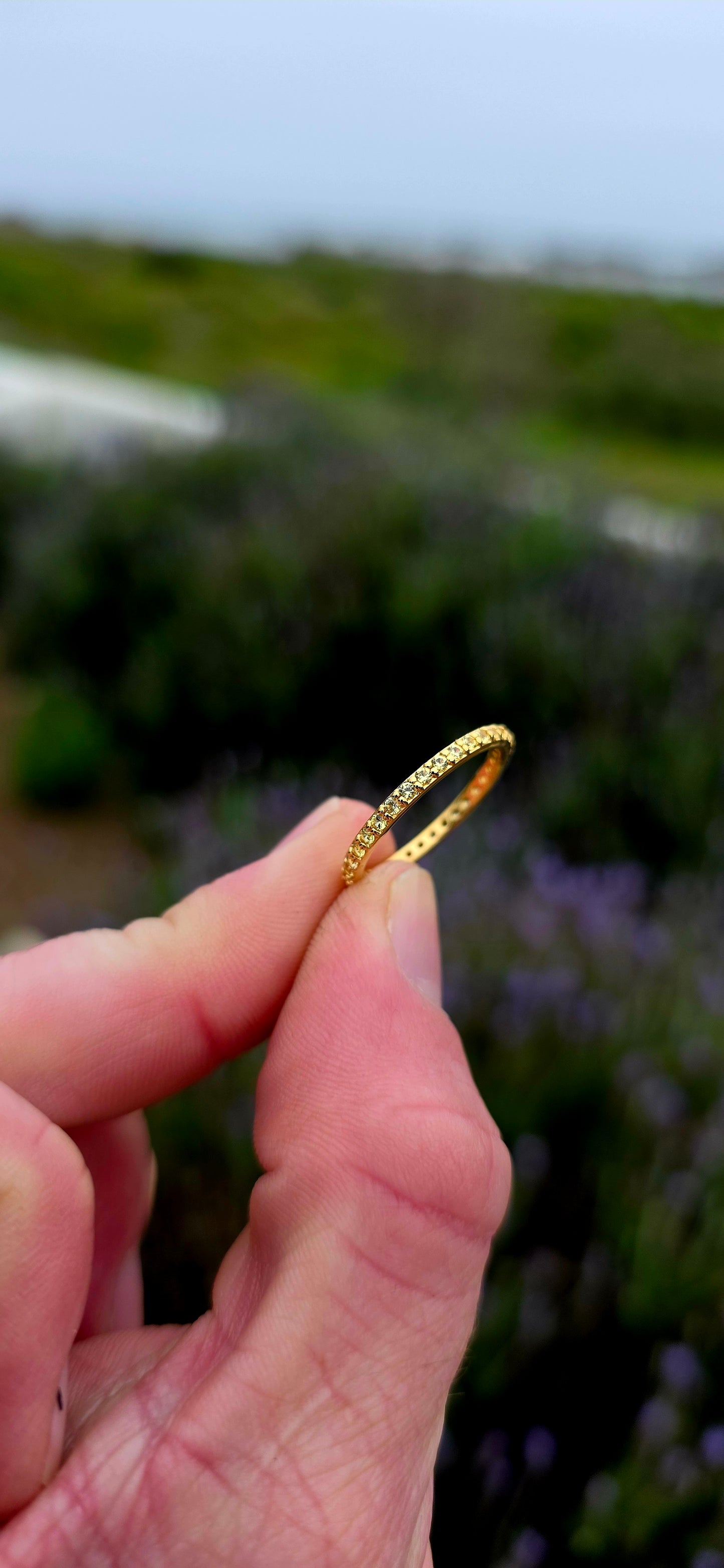 A fine and dainty full eternity stacking band, crafted in solid sterling silver and finished with a rich layer of 18ct yellow gold plating for that warm, sun-kissed glow.