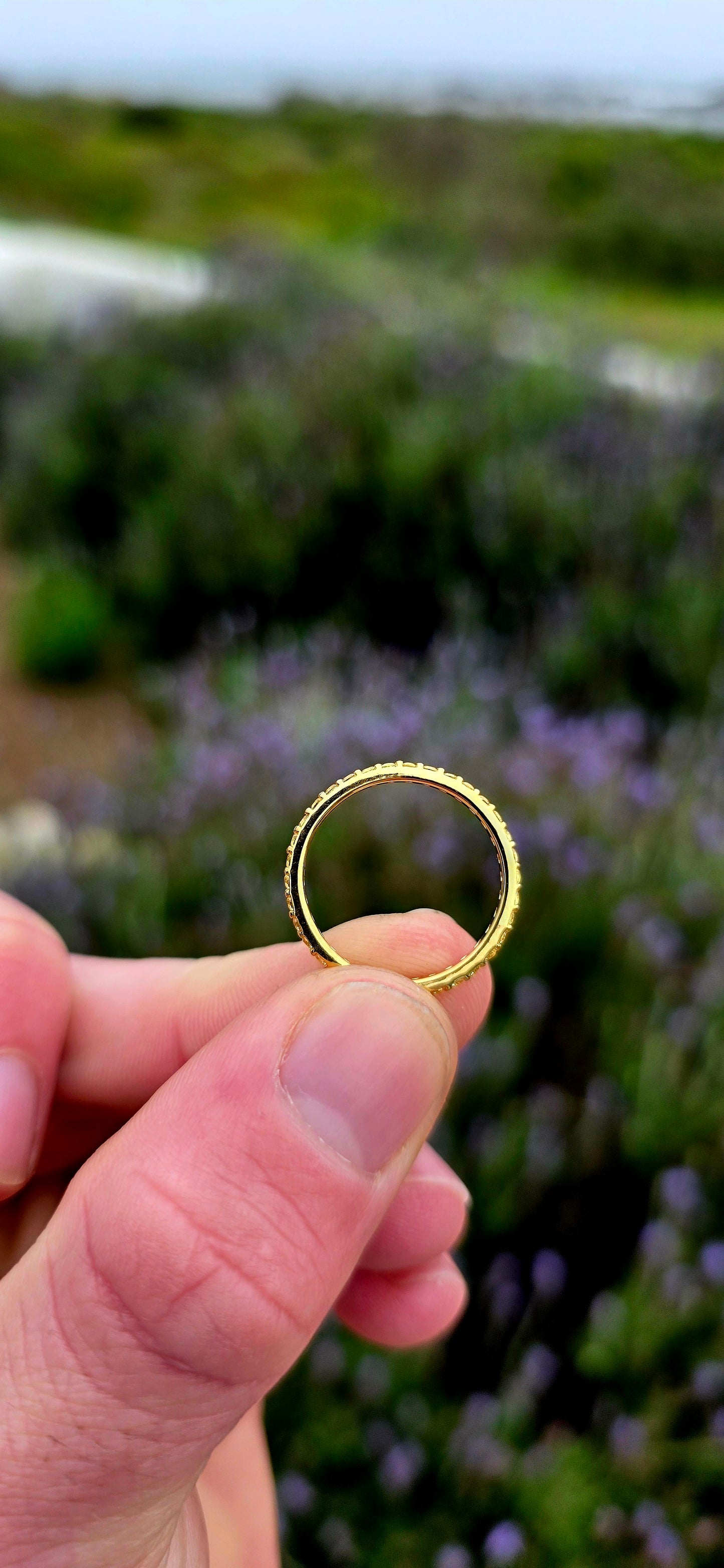 A fine and dainty full eternity stacking band, crafted in solid sterling silver and finished with a rich layer of 18ct yellow gold plating for that warm, sun-kissed glow.