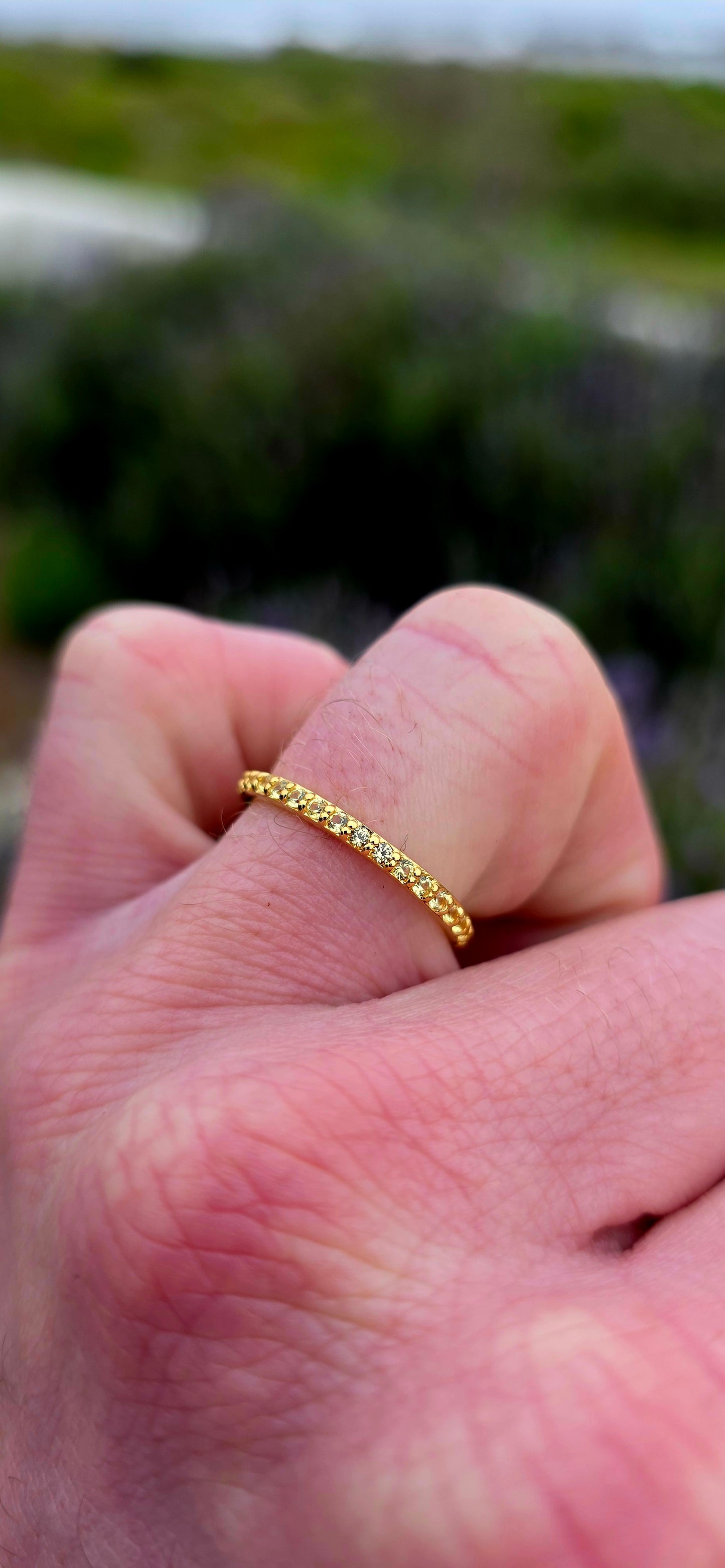 A fine and dainty full eternity stacking band, crafted in solid sterling silver and finished with a rich layer of 18ct yellow gold plating for that warm, sun-kissed glow.
