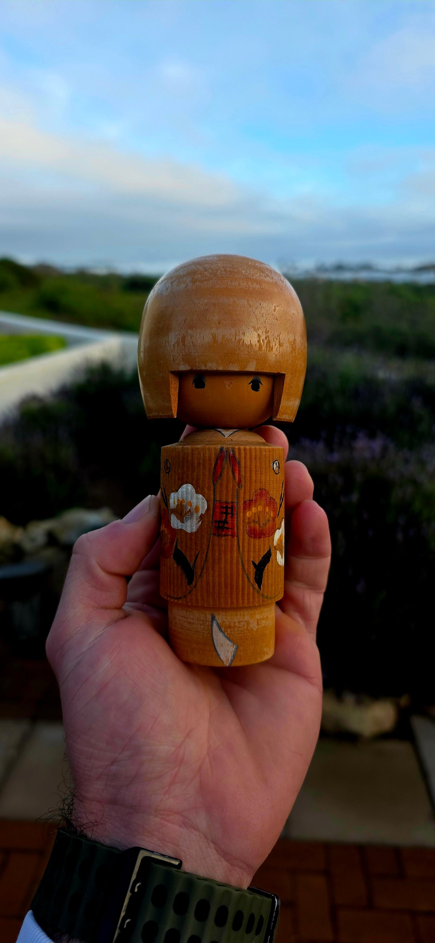 A delightful and highly collectible vintage Japanese Kokeshi doll dating to the 1950s.