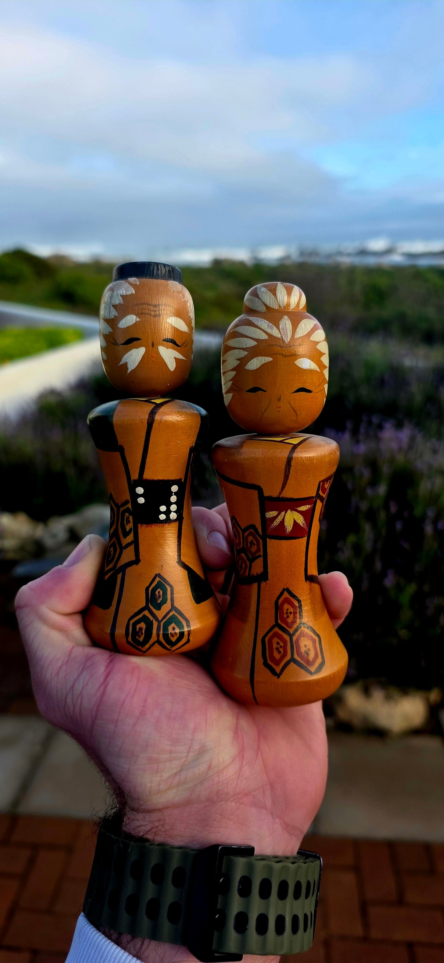 A wonderfully charming and highly collectible pair of vintage Japanese Kokeshi dolls dating to the 1950s .