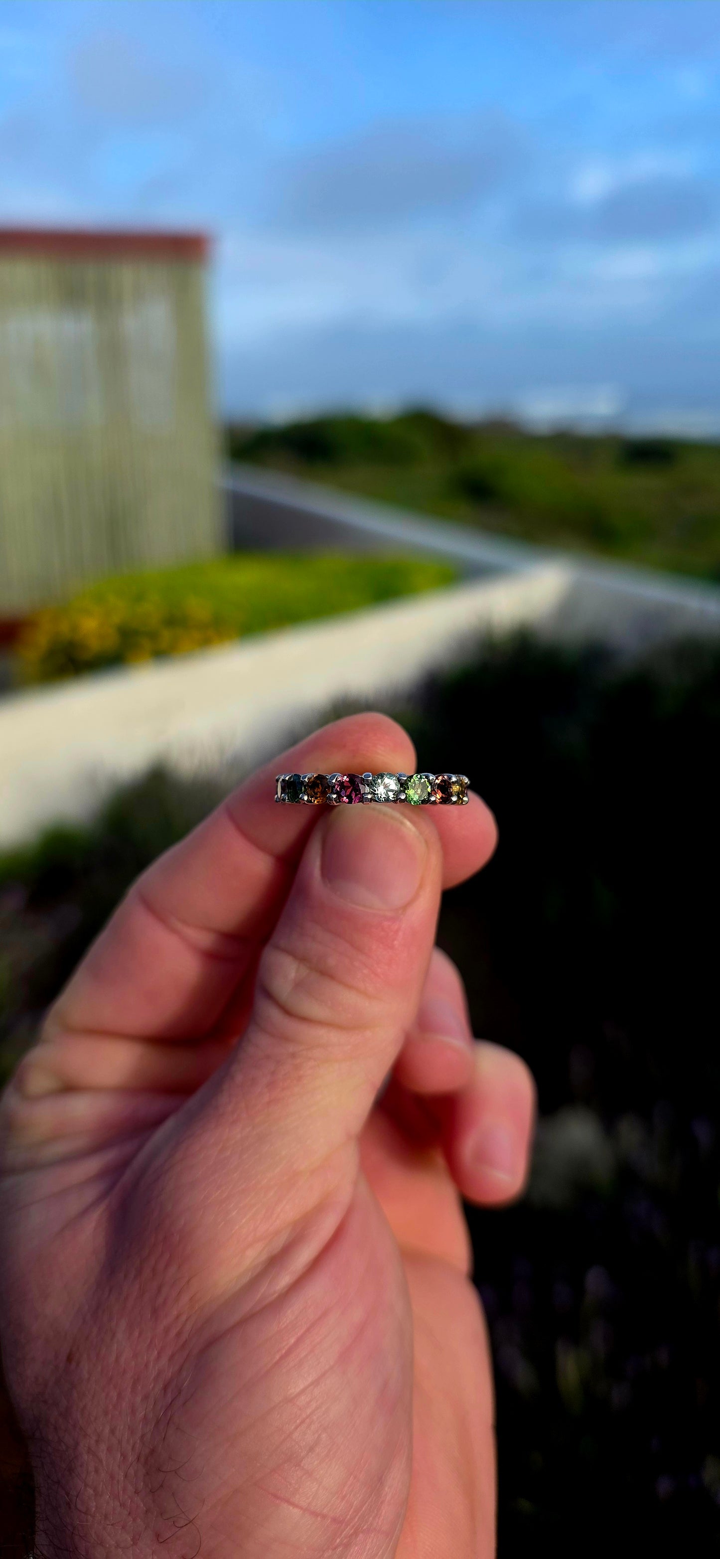 A little rainbow captured in sterling silver... and wrapped around your finger forever.