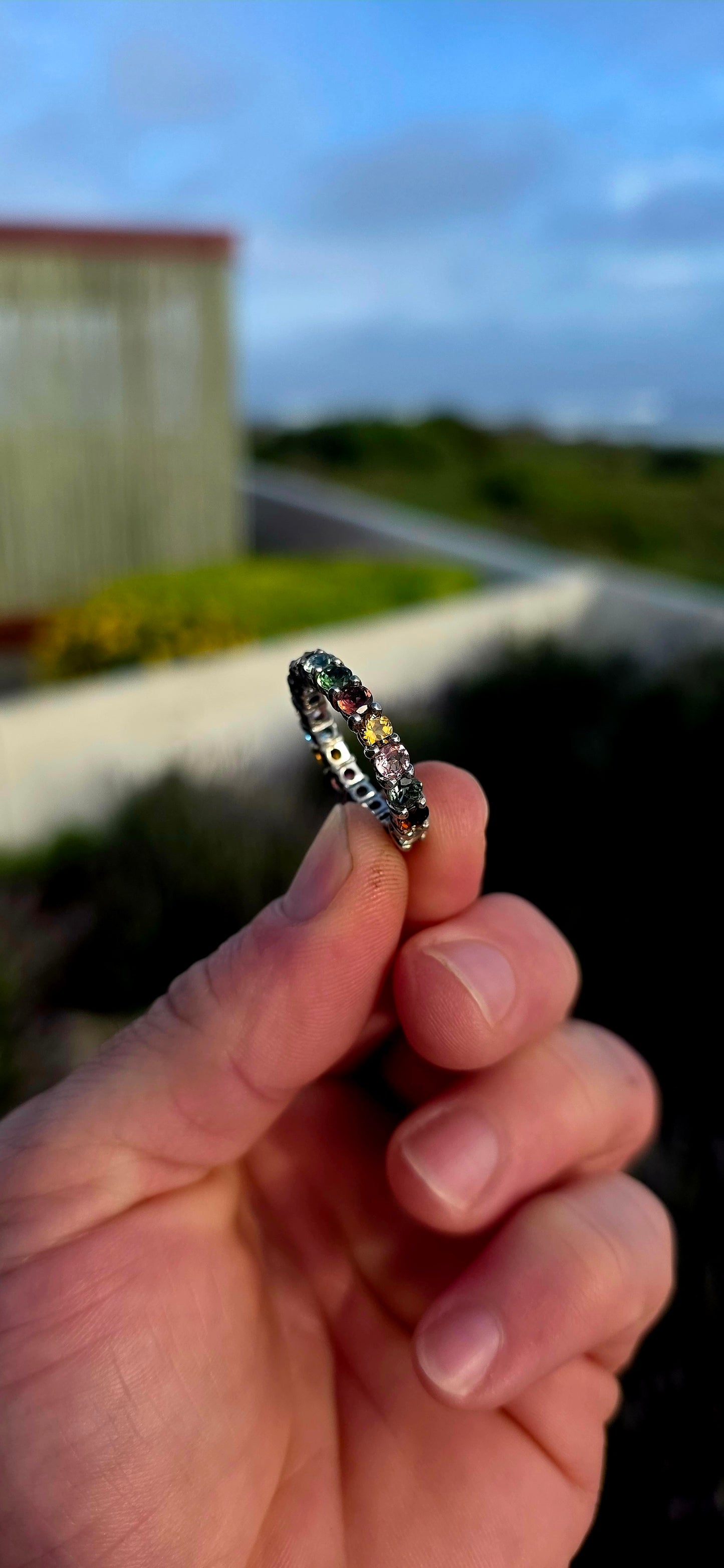 A little rainbow captured in sterling silver... and wrapped around your finger forever.