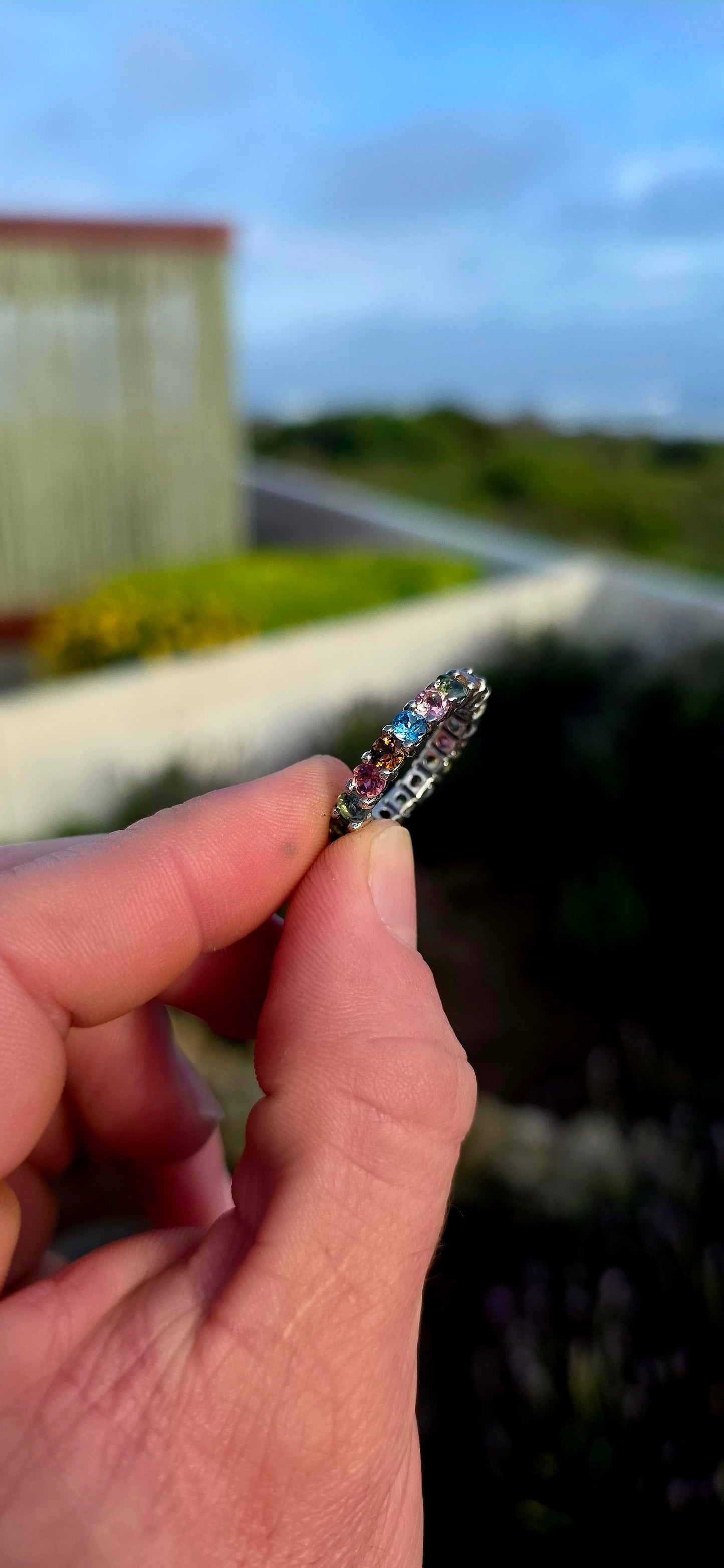 A little rainbow captured in sterling silver... and wrapped around your finger forever.