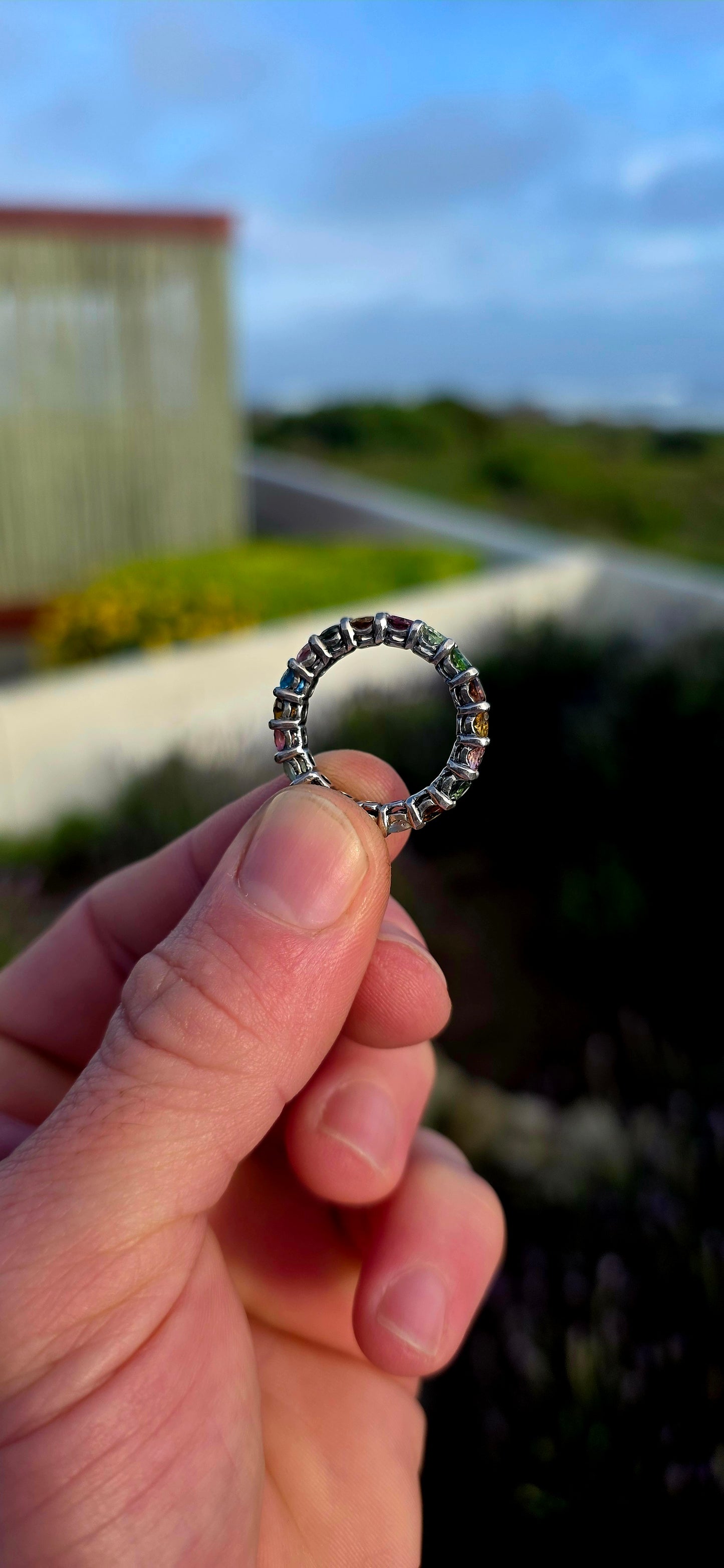 A little rainbow captured in sterling silver... and wrapped around your finger forever.