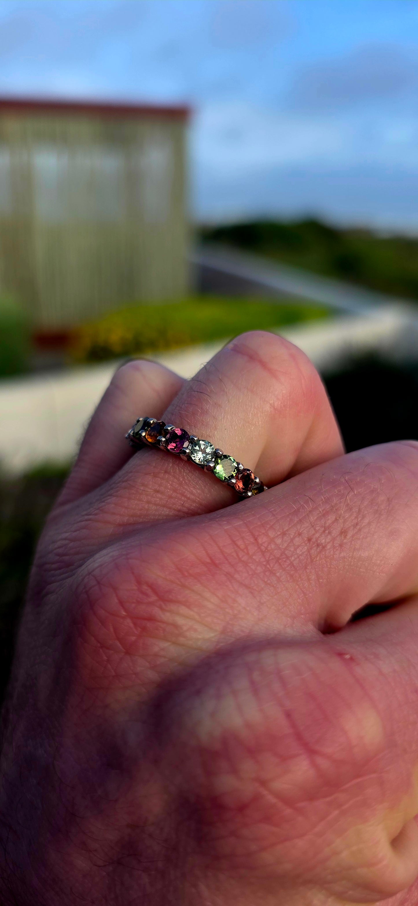 A little rainbow captured in sterling silver... and wrapped around your finger forever.