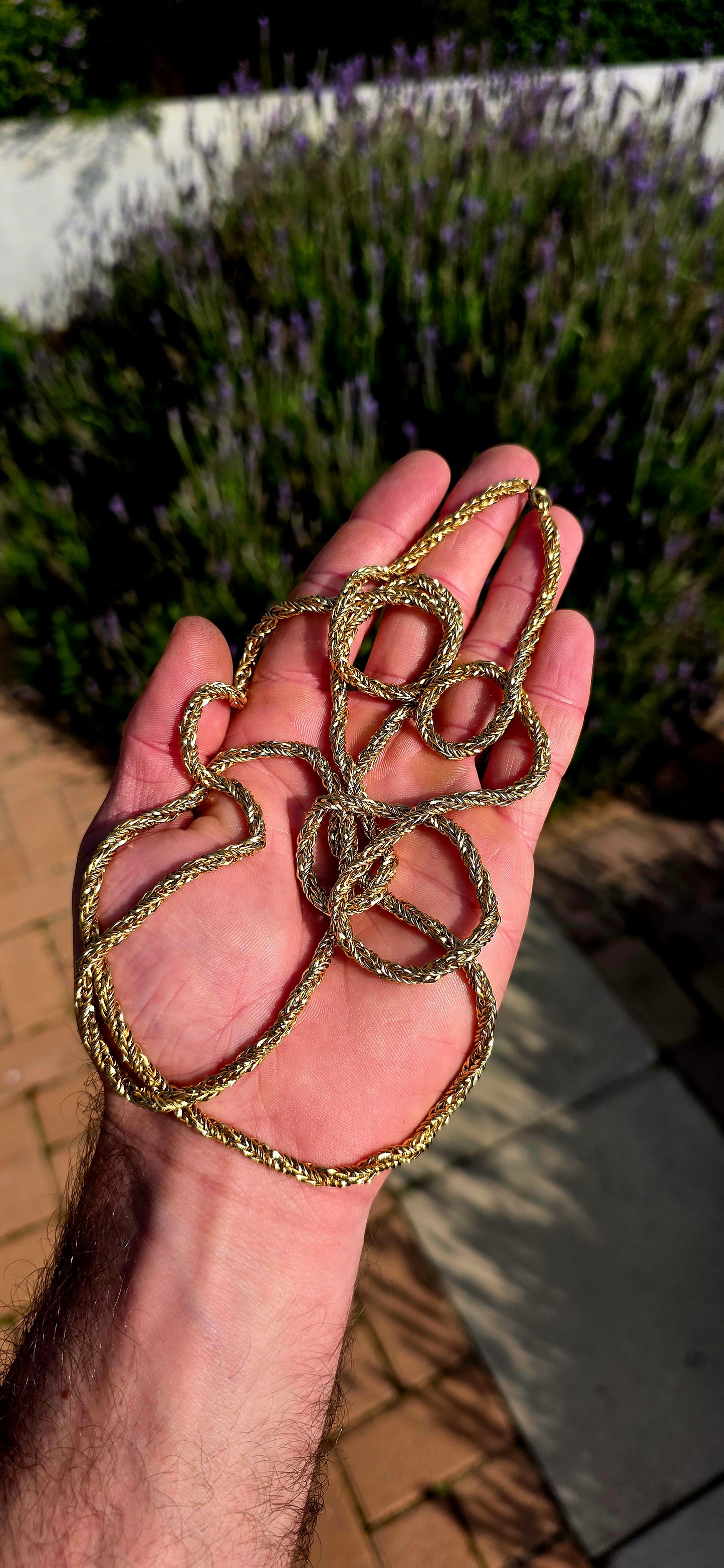 Crafted in a rich gold-plated finish, this beautiful vintage rope chain features an intricate twisted wave rope design that catches the light from every angle, creating a luxurious golden shimmer with every movement.