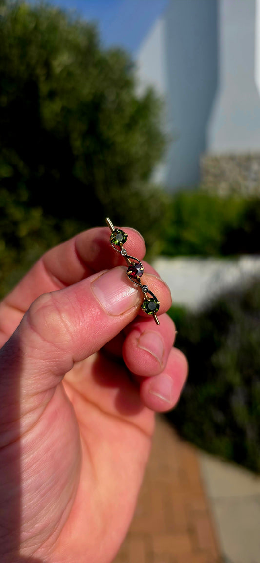 Graceful, delicate, and unmistakably Edwardian... this enchanting antique bar brooch captures the flowing beauty of the Art Nouveau movement with its elegant organic lines.
