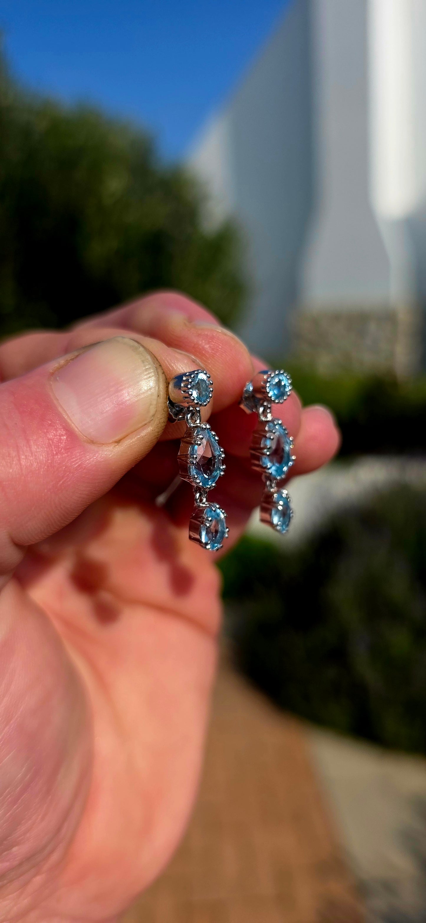 Elegant, graceful, and full of movement... these beautiful sterling silver drop earrings capture the crystal-clear beauty of a cloudless summer sky.
