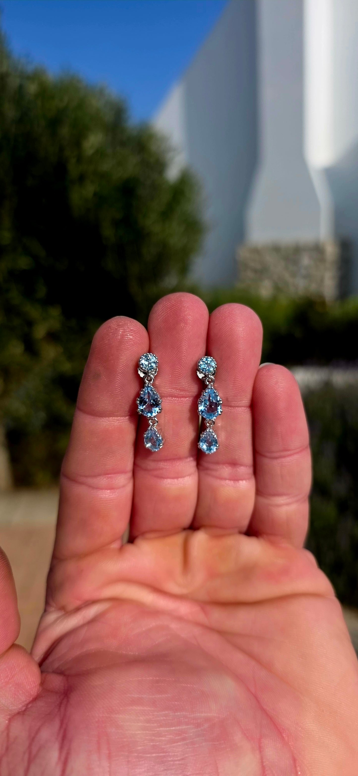 Elegant, graceful, and full of movement... these beautiful sterling silver drop earrings capture the crystal-clear beauty of a cloudless summer sky.