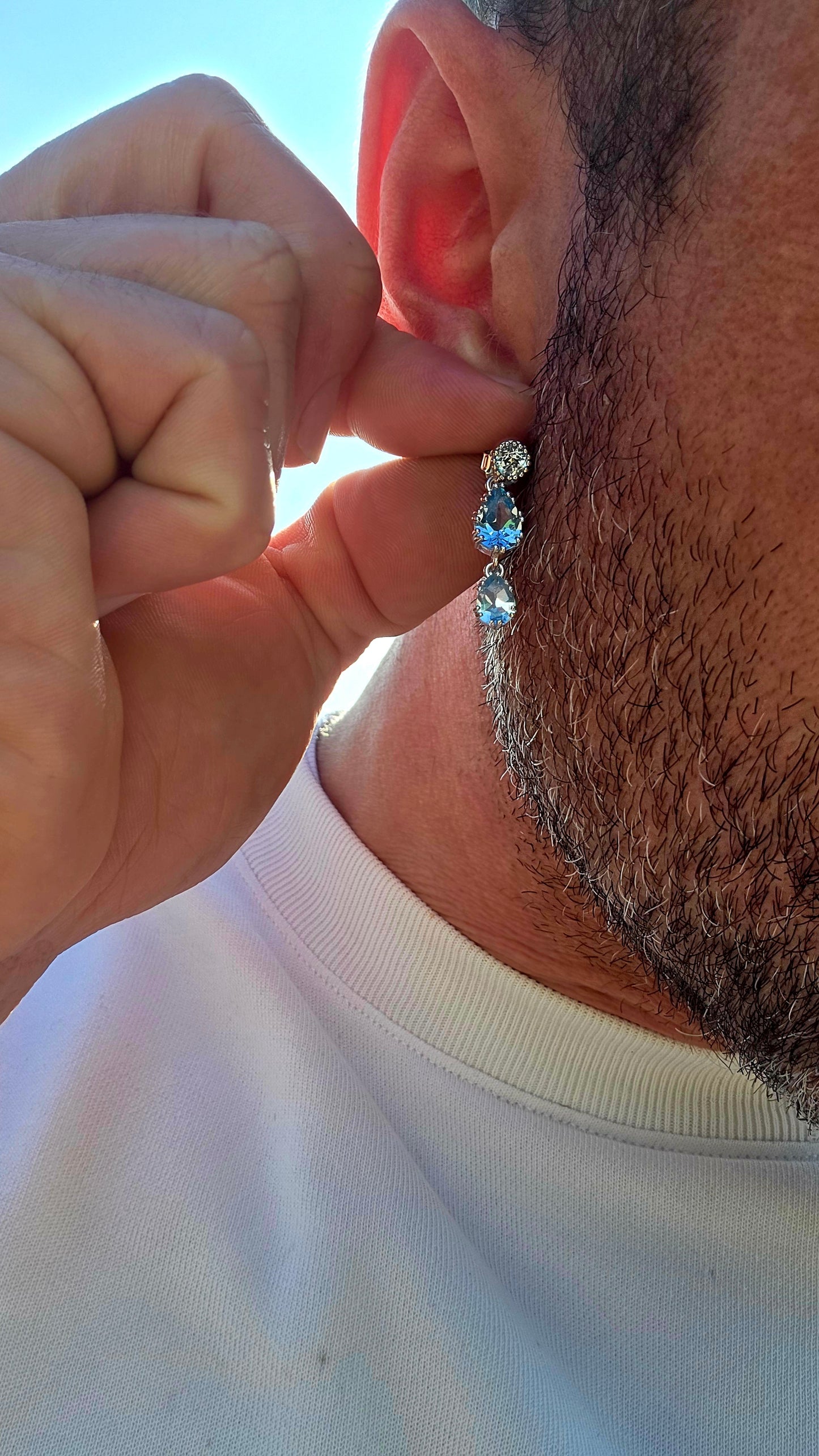 Elegant, graceful, and full of movement... these beautiful sterling silver drop earrings capture the crystal-clear beauty of a cloudless summer sky.