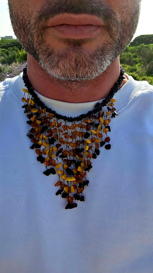 Handmade and gloriously bold, this chunky statement piece is crafted from natural Baltic amber chips.
