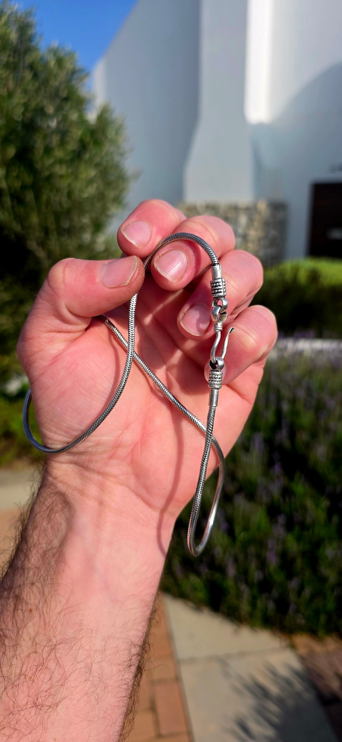 A beautiful staple with unmistakable artisan character... this traditional Balinese sterling silver snake chain is the perfect balance of elegance and bold craftsmanship.