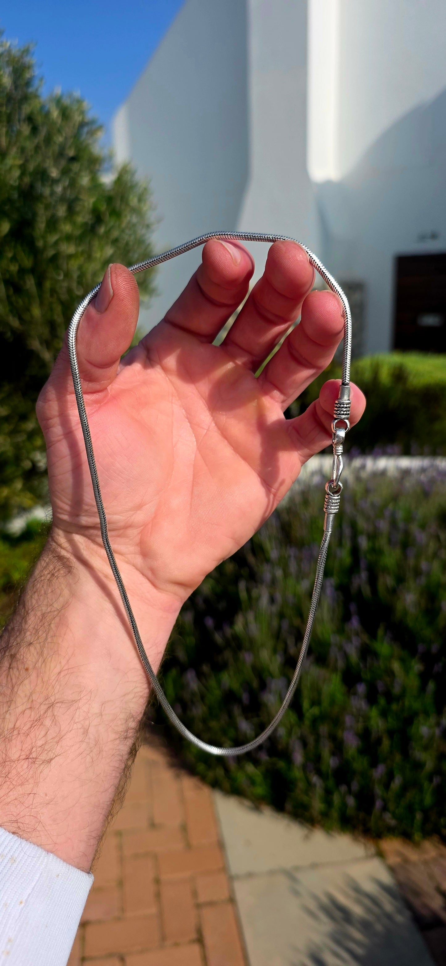 A beautiful staple with unmistakable artisan character... this traditional Balinese sterling silver snake chain is the perfect balance of elegance and bold craftsmanship.