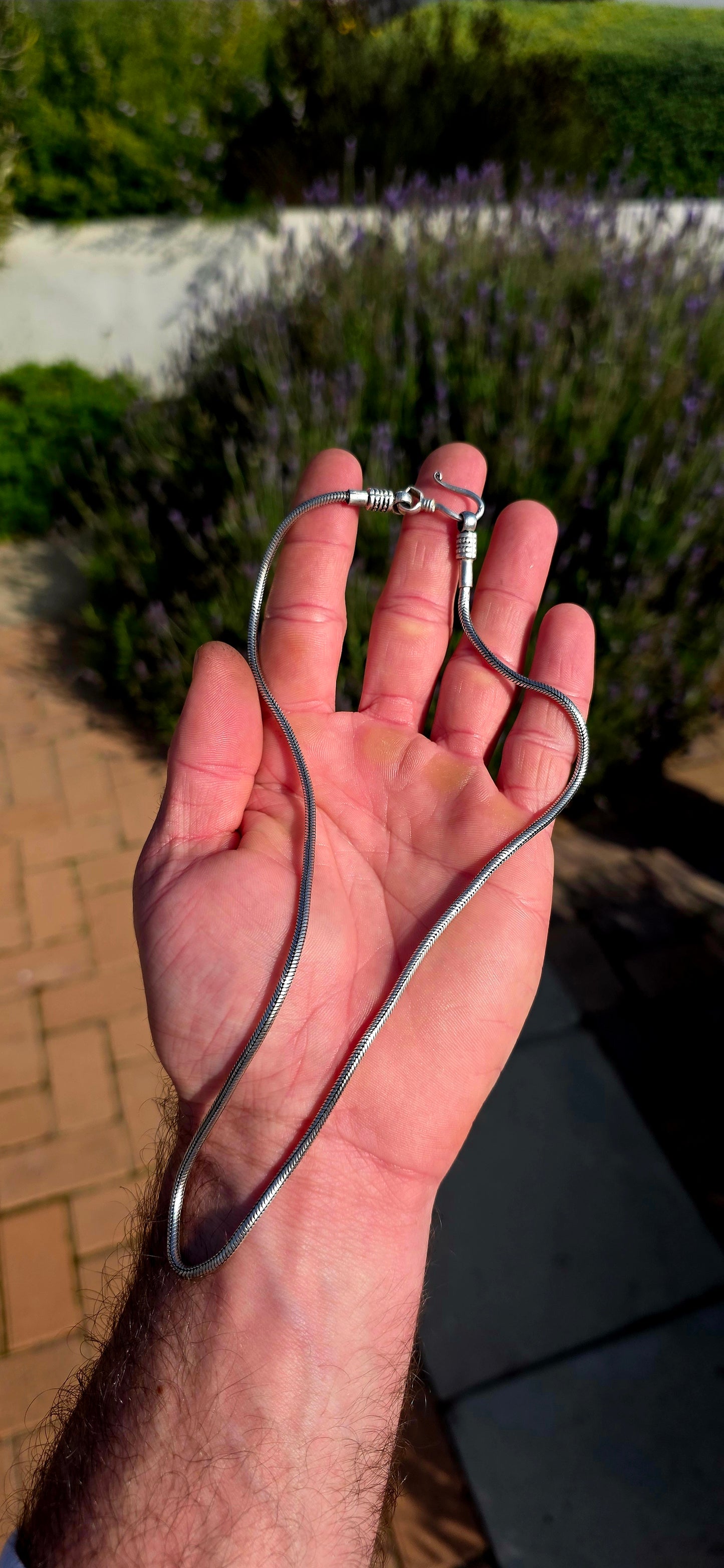 A beautiful staple with unmistakable artisan character... this traditional Balinese sterling silver snake chain is the perfect balance of elegance and bold craftsmanship.