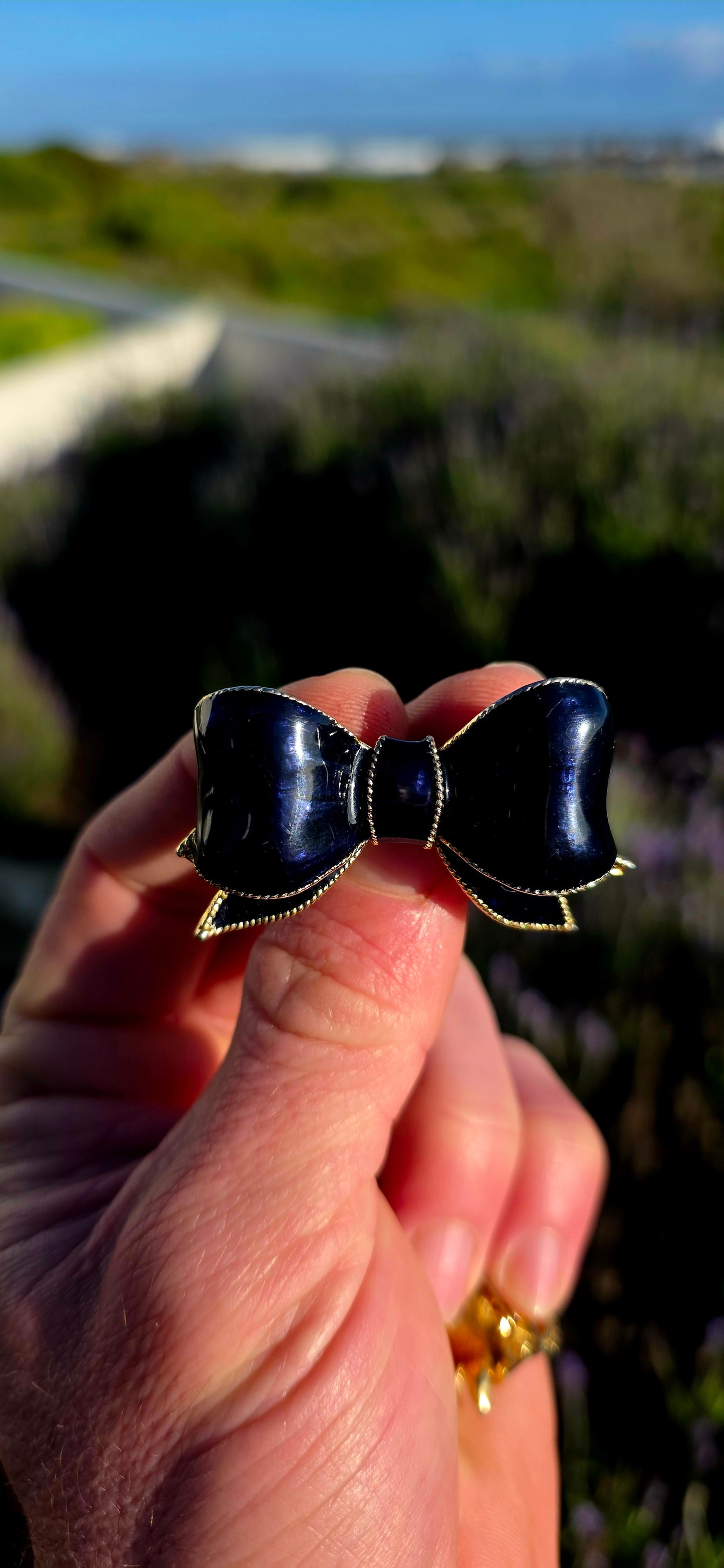 This delightful matching collection of vintage 1980s designer costume ribbon brooches by Sphinx is the perfect blend of elegance and playful sophistication.