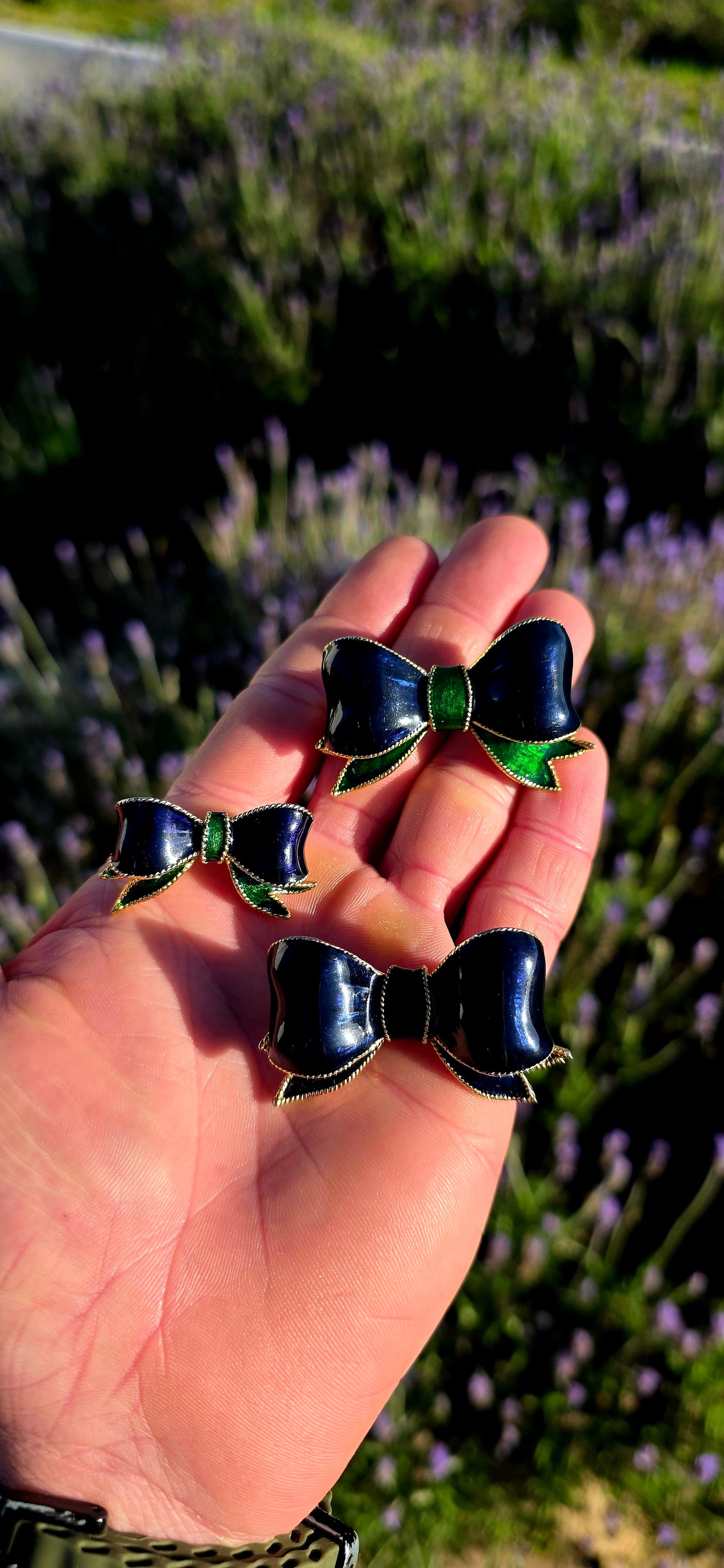 This delightful matching collection of vintage 1980s designer costume ribbon brooches by Sphinx is the perfect blend of elegance and playful sophistication.
