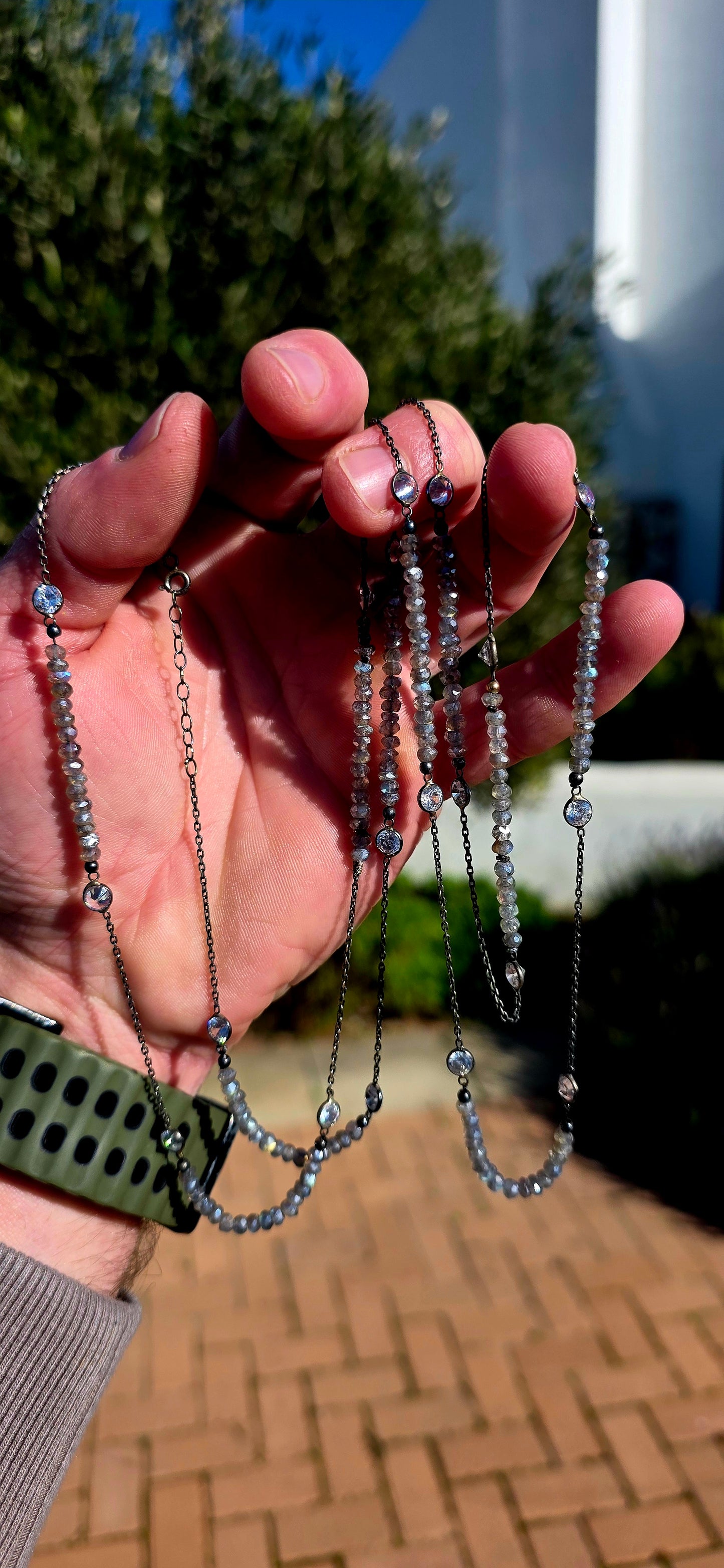 Elegant, understated and sophisticated... this extra-long handcrafted necklace is one of those pieces that sparkles with every movement while allowing the natural beauty of the gemstones to take centre stage.
