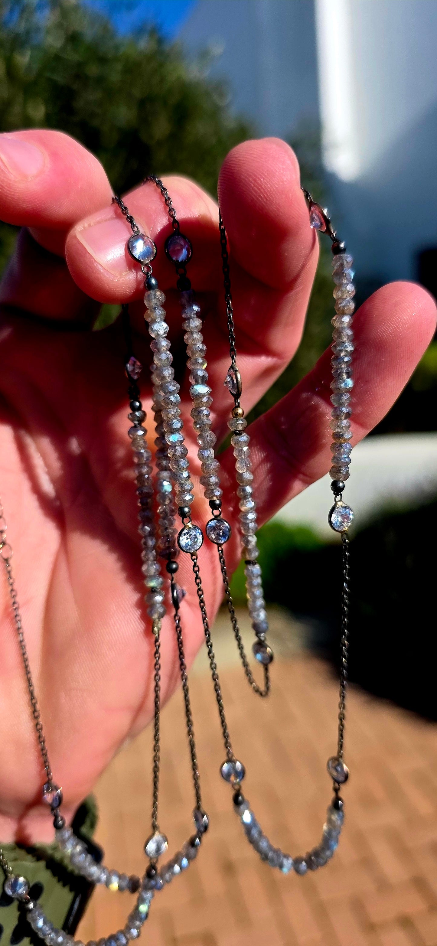 Elegant, understated and sophisticated... this extra-long handcrafted necklace is one of those pieces that sparkles with every movement while allowing the natural beauty of the gemstones to take centre stage.