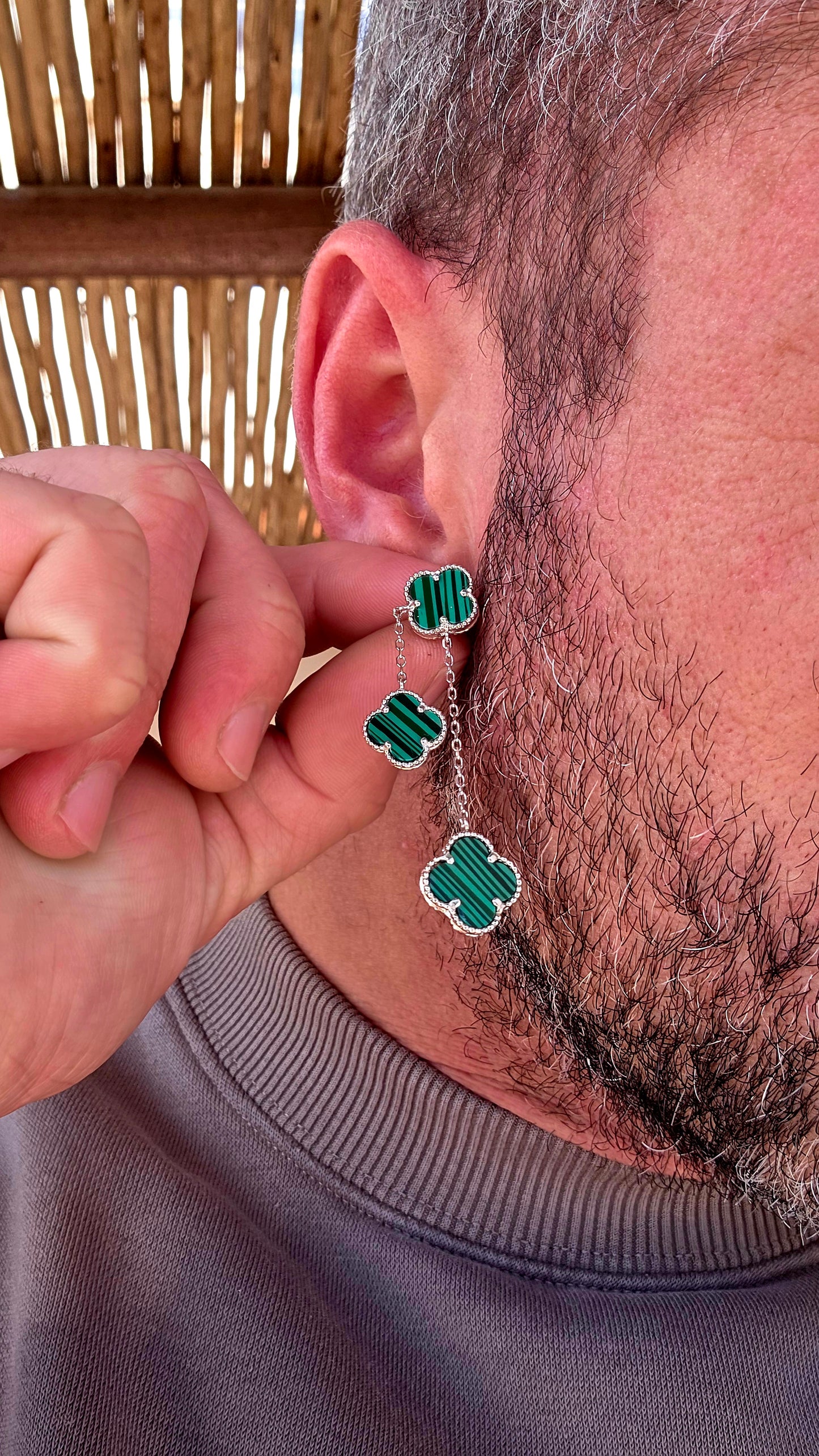 Crafted in sterling silver, each earring features three beautifully carved  malachite clovers, delicately framed with fine beaded silver borders that add a touch of vintage-inspired elegance.