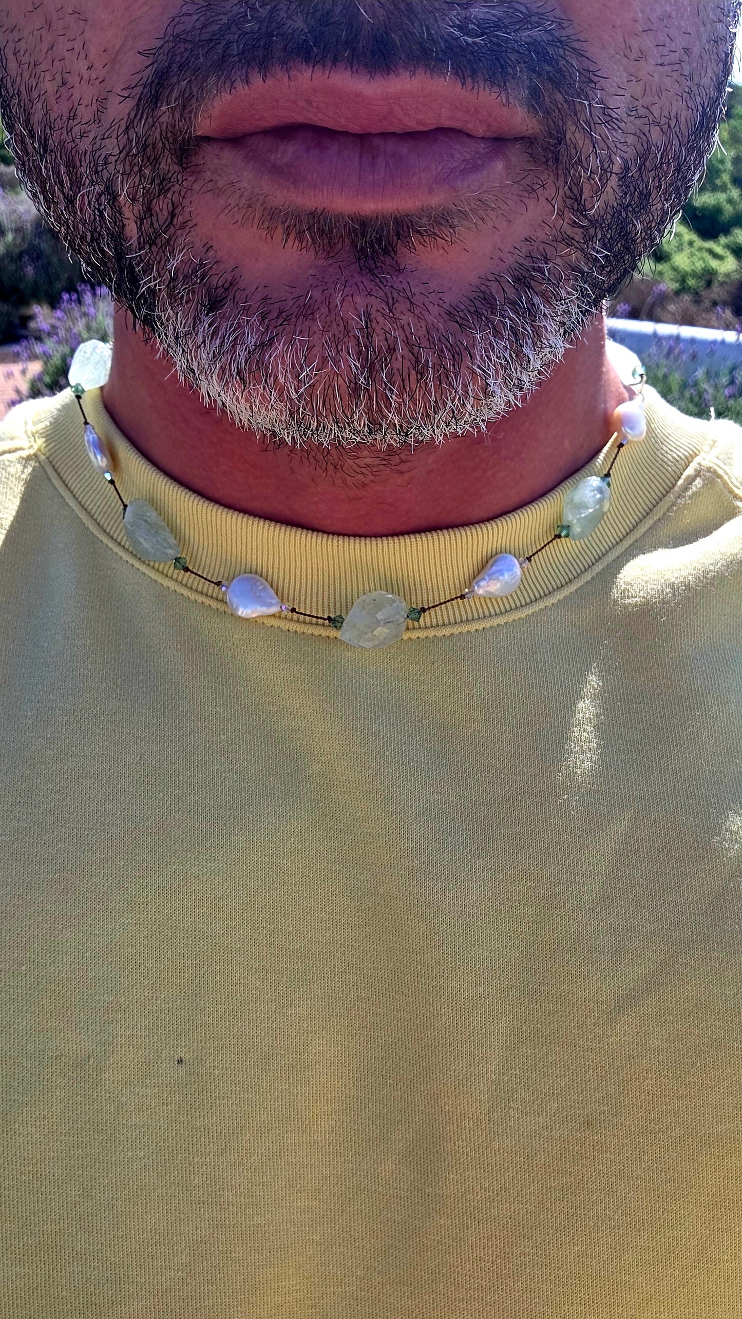 An effortlessly elegant designer necklace by renowned New York jewellery designer Margo Morrison, celebrated for her signature use of organic gemstones, luminous pearls, and delicate silk threading.