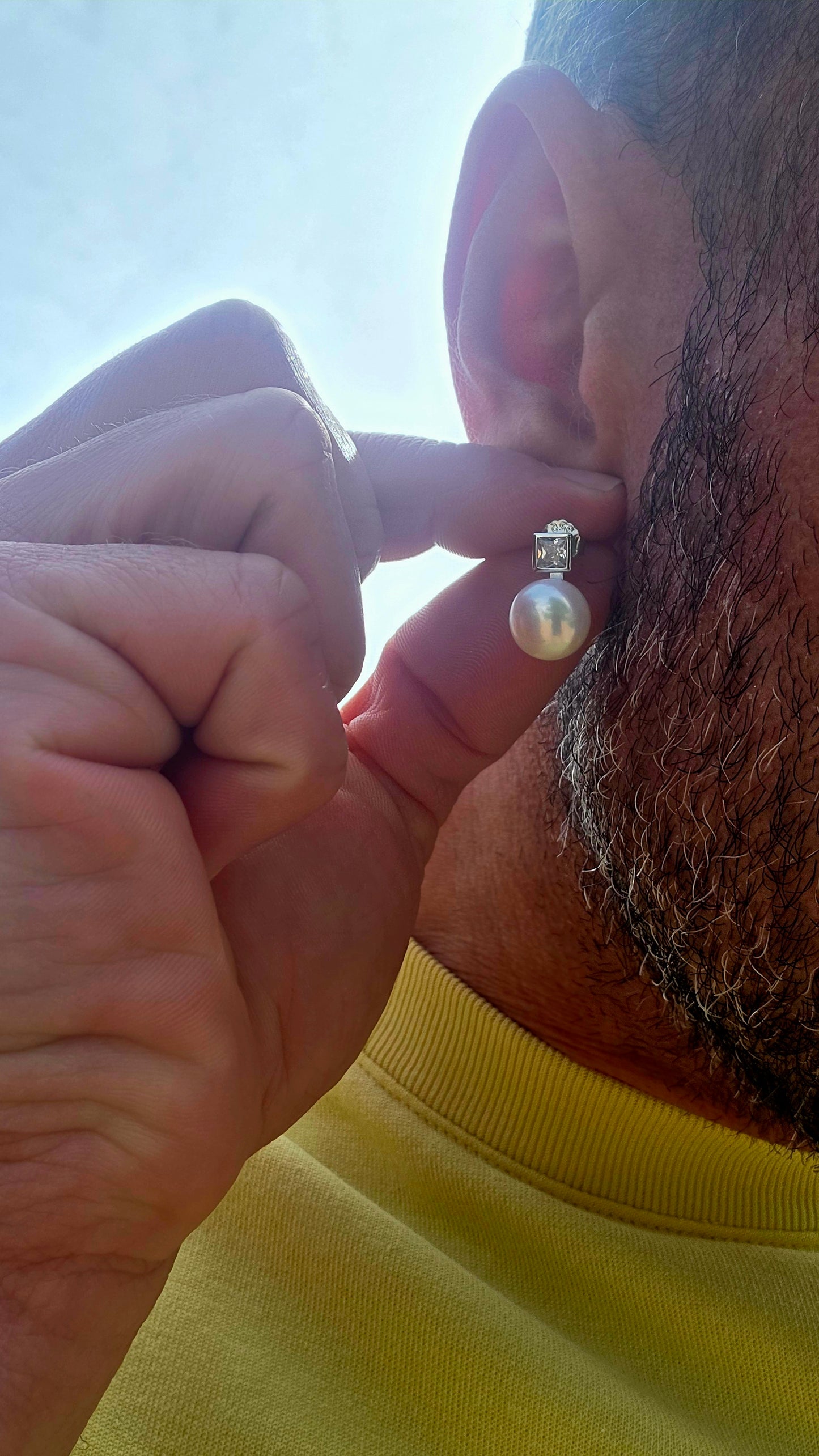 Classic, elegant and forever in style... these beautiful sterling silver stud earrings combine the beauty of pearls with the captivating sparkle of brilliant cubic zirconia.