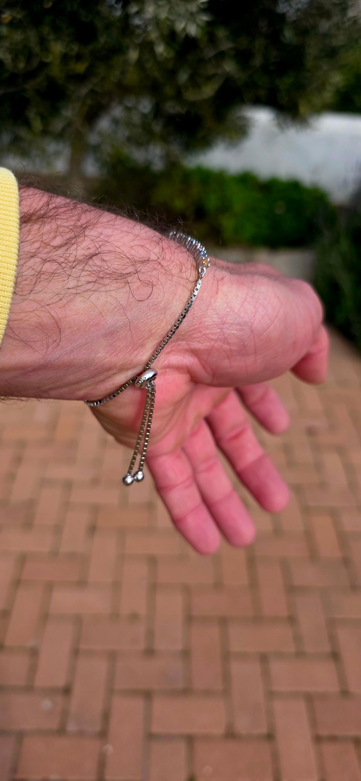 Vibrant ans elegant ... this beautiful unisex sterling silver tennis bracelet is a celebration of colour, featuring a dazzling spectrum of natural sapphires.