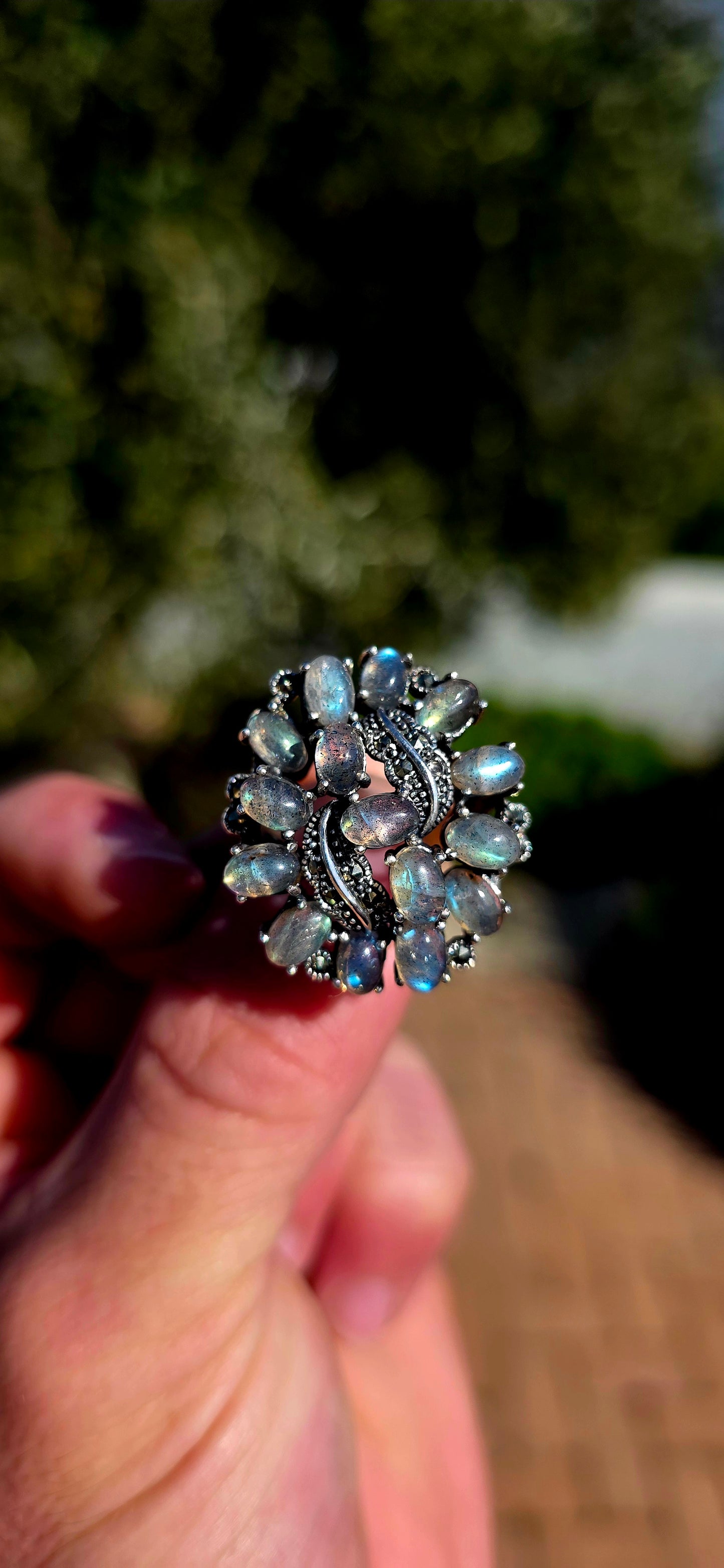 This breathtaking sterling silver statement ring is a celebration of nature's most magical gemstone — spectacular labradorite!