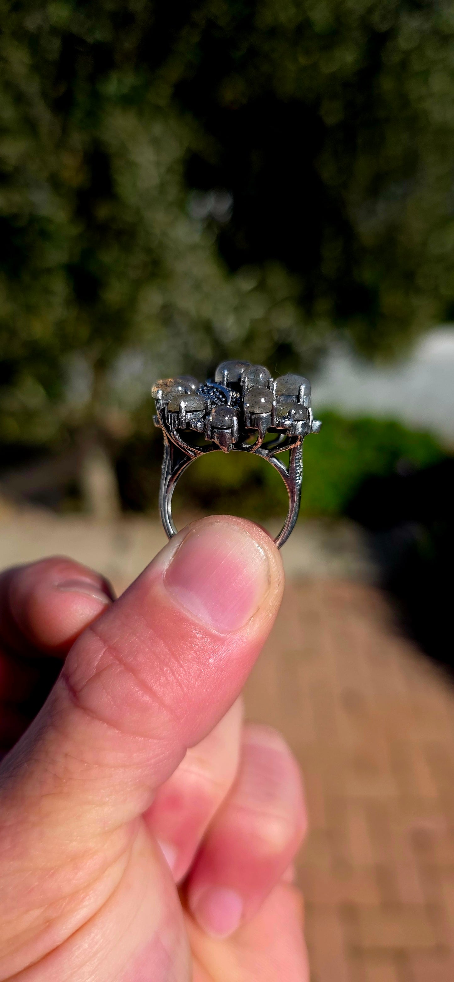 This breathtaking sterling silver statement ring is a celebration of nature's most magical gemstone — spectacular labradorite!